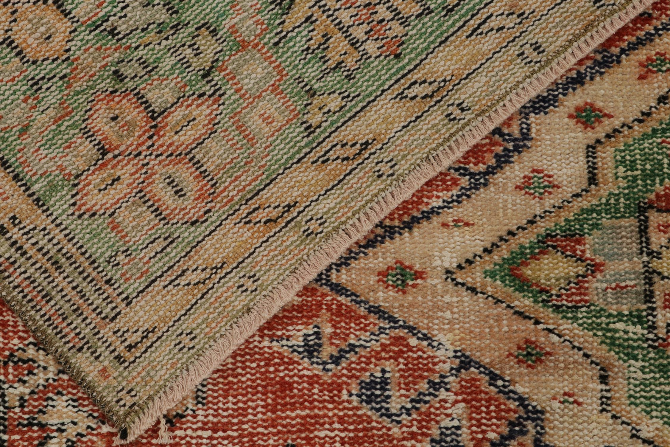 Mid-20th Century Vintage Distressed Rug in Red with Green and Beige Medallions, by Rug & Kilim For Sale