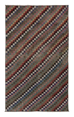 Tapis vintage vieilli avec mosaïque de diamants et bordures géométriques - Rug & Kilim