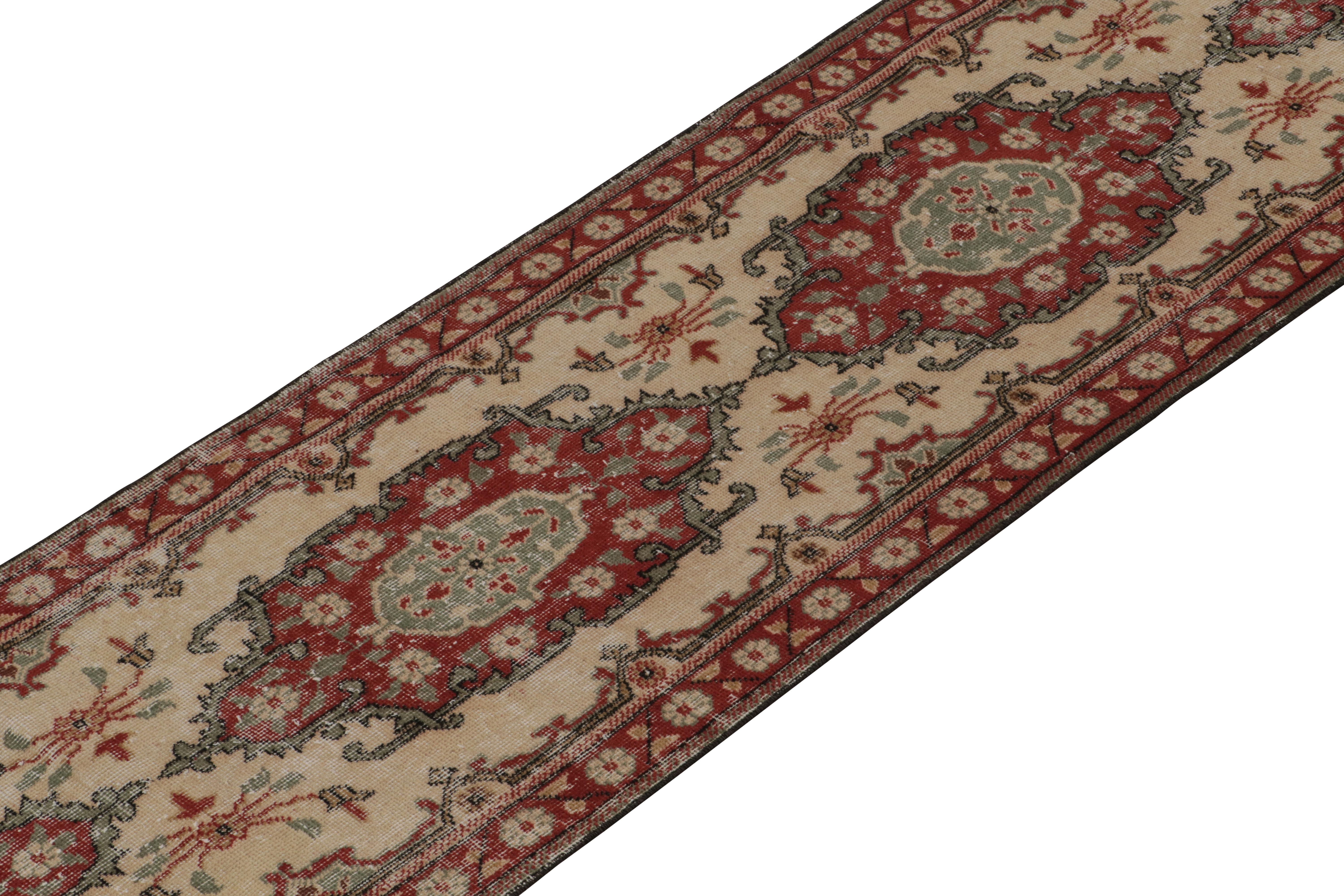 Indian Vintage Distressed Runner in Beige with Red & Green Medallions - by Rug & Kilim For Sale