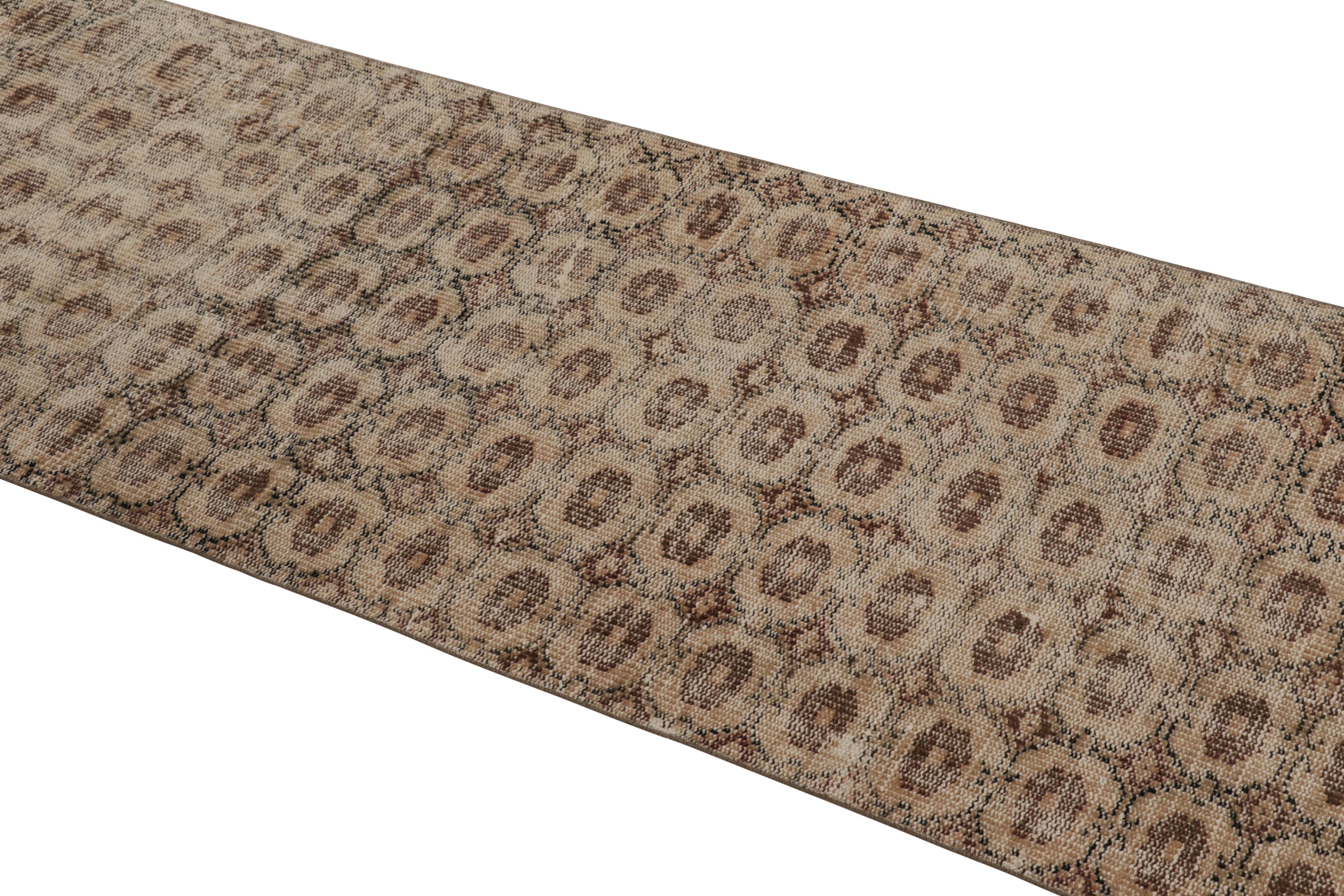 This vintage runner rug is a 3x8 Turkish distressed piece, made with hand-knotted wool circa mid-20th century. It is an exciting new addition to our collection of distressed Turkish rugs.

On the Design: 

Admirers of the craft will especially