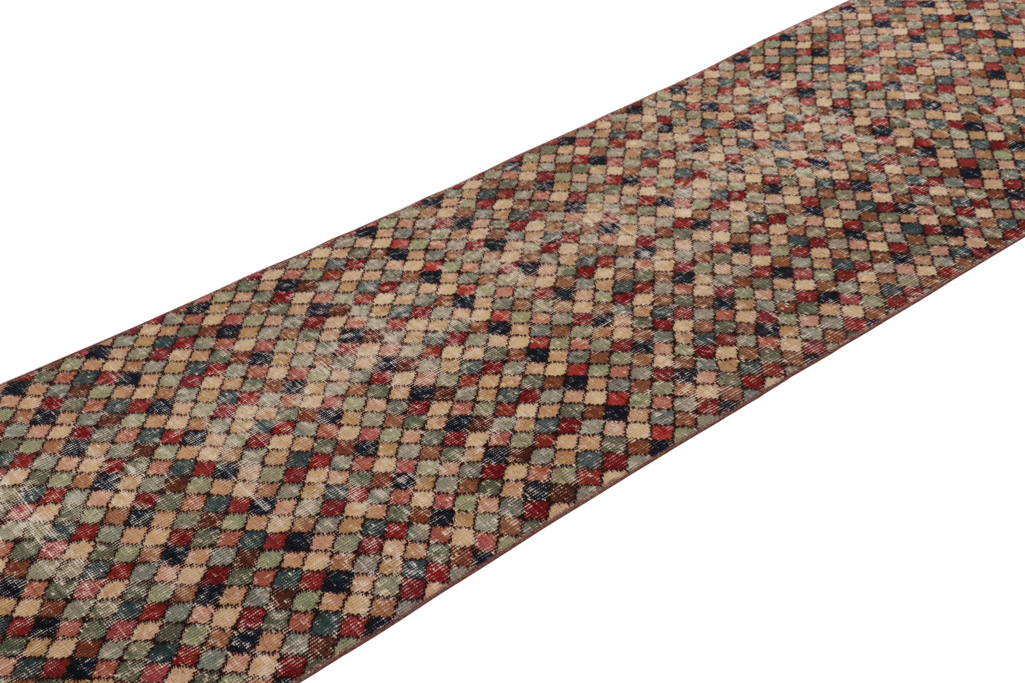 This vintage runner rug is a 3x10 Turkish distressed piece, made with hand-knotted wool circa mid-20th century. It is an exciting new addition to our collection of distressed Turkish runner rugs.

On the Design: 

Admirers of the craft will