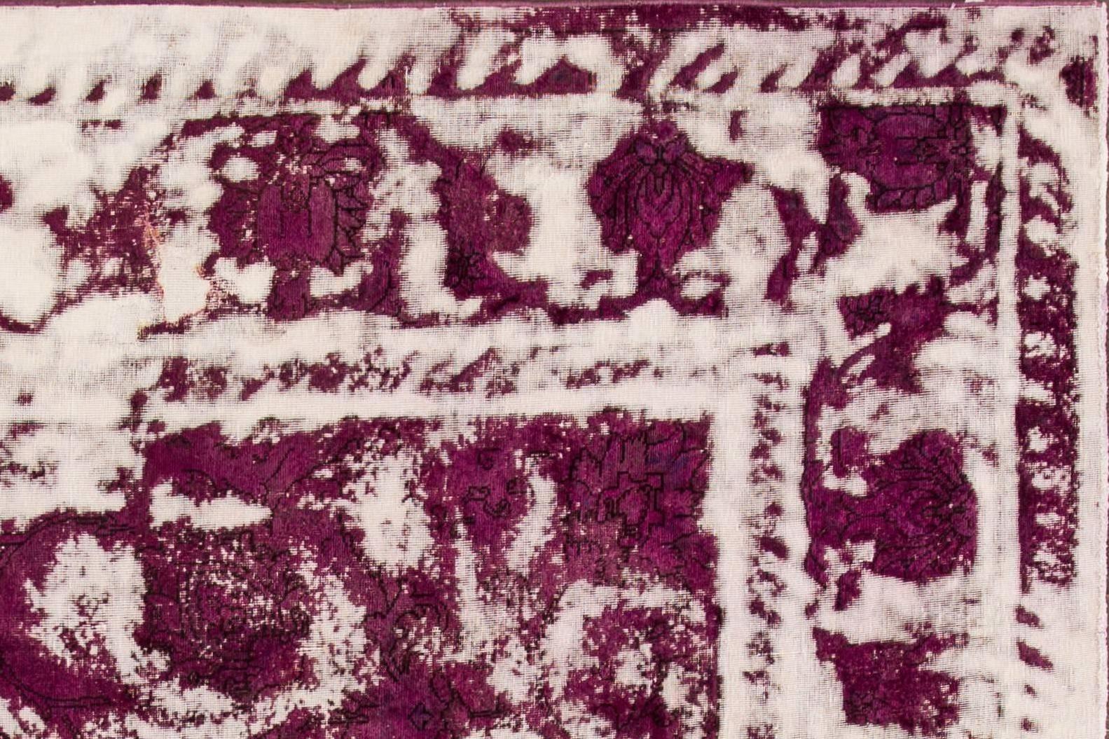 1920s vintage Persian carpet. This square-shaped, distressed piece features a wide, ivory border and dark purple field, with an all-over abstract pattern. Measures: 11.02 x 11.06.