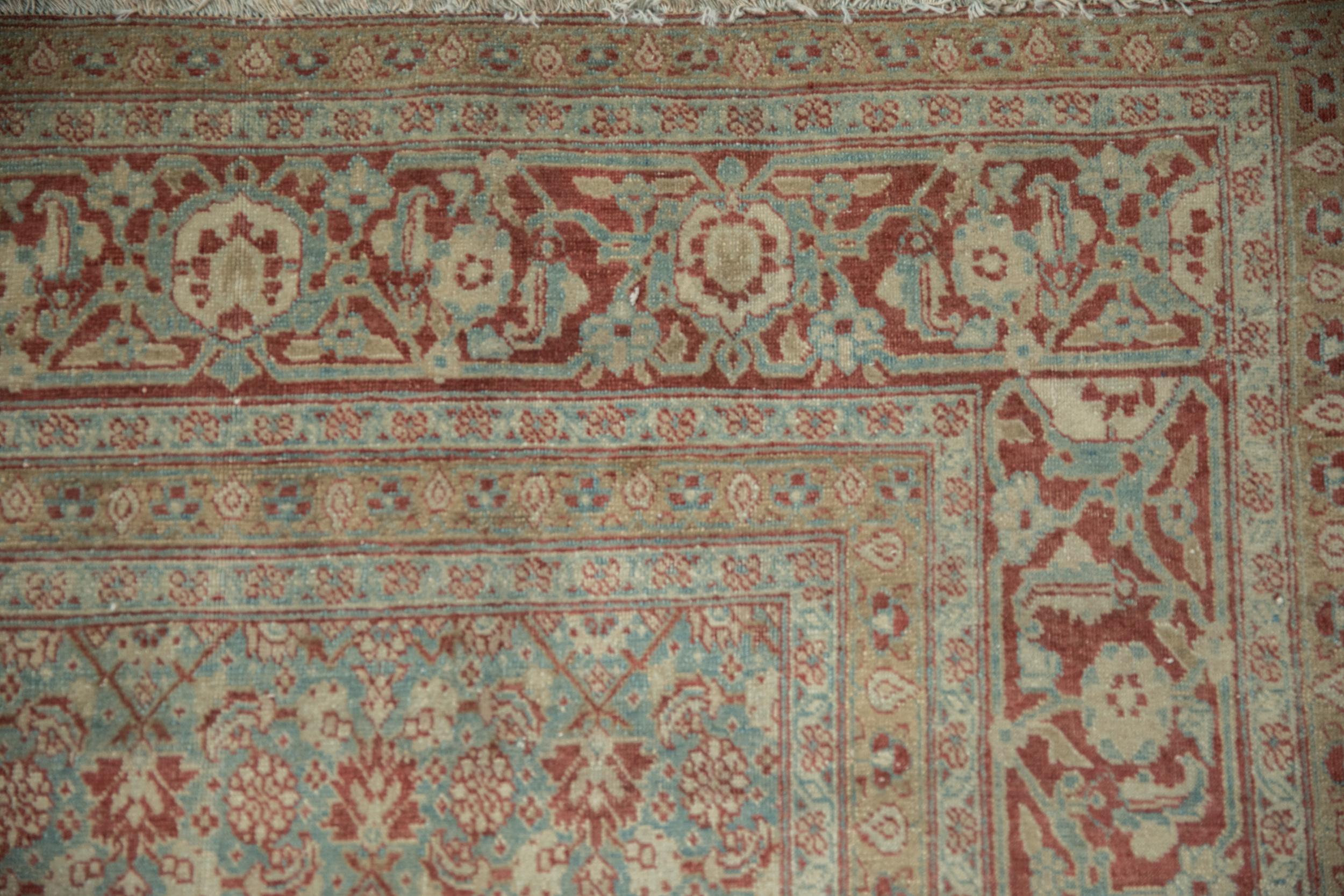 Persian Vintage Distressed Tabriz Carpet For Sale