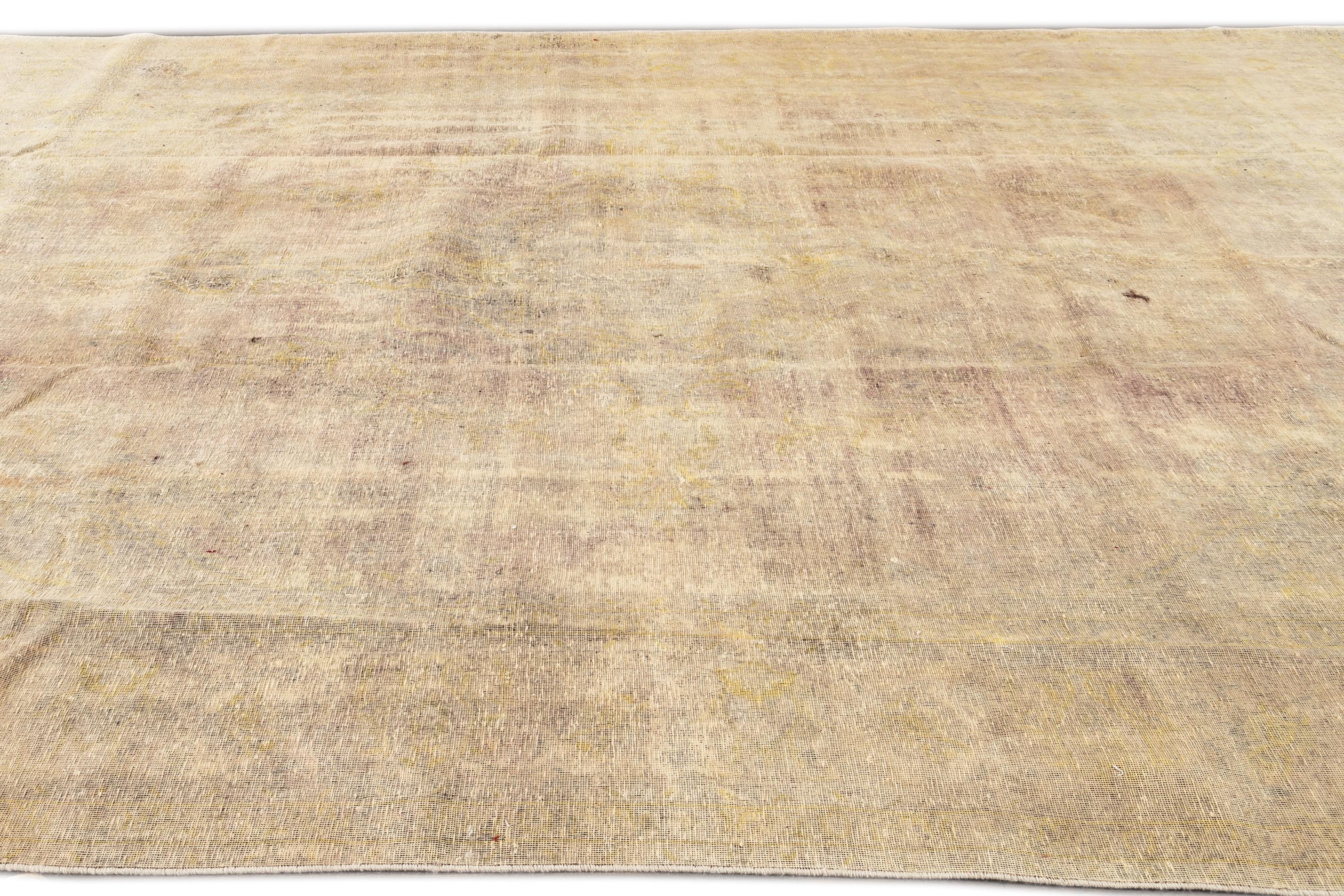 20th Century Vintage Distressed Tabriz Rug For Sale