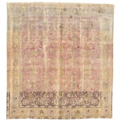 Tappeto Tabriz vintage con segni di usura