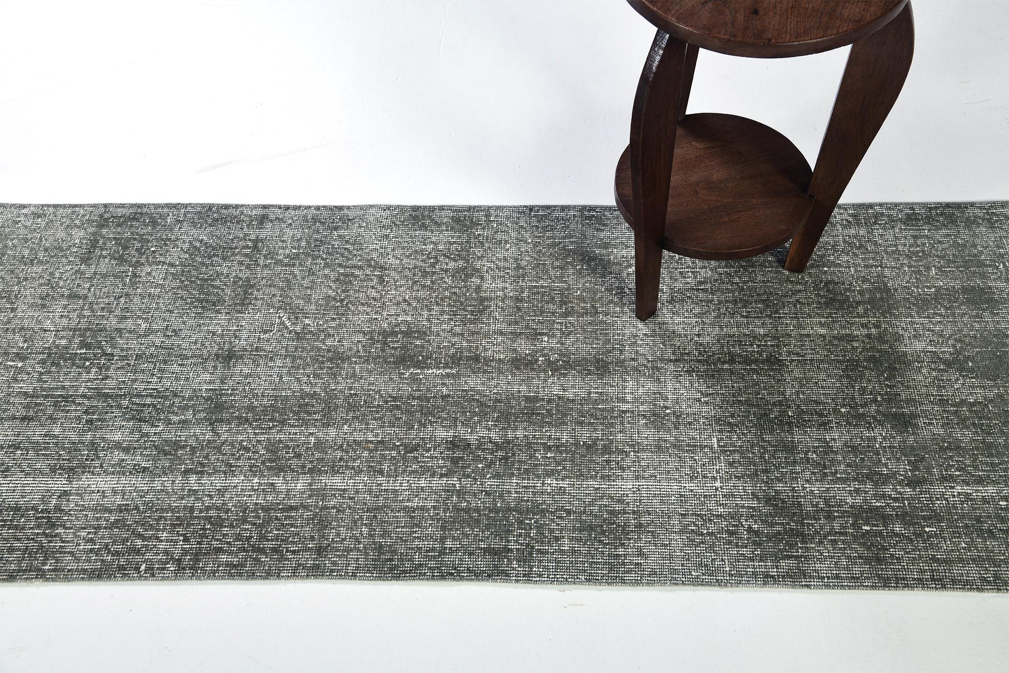 Mid-20th Century Vintage Distressed Turkish Anatolian Runner For Sale