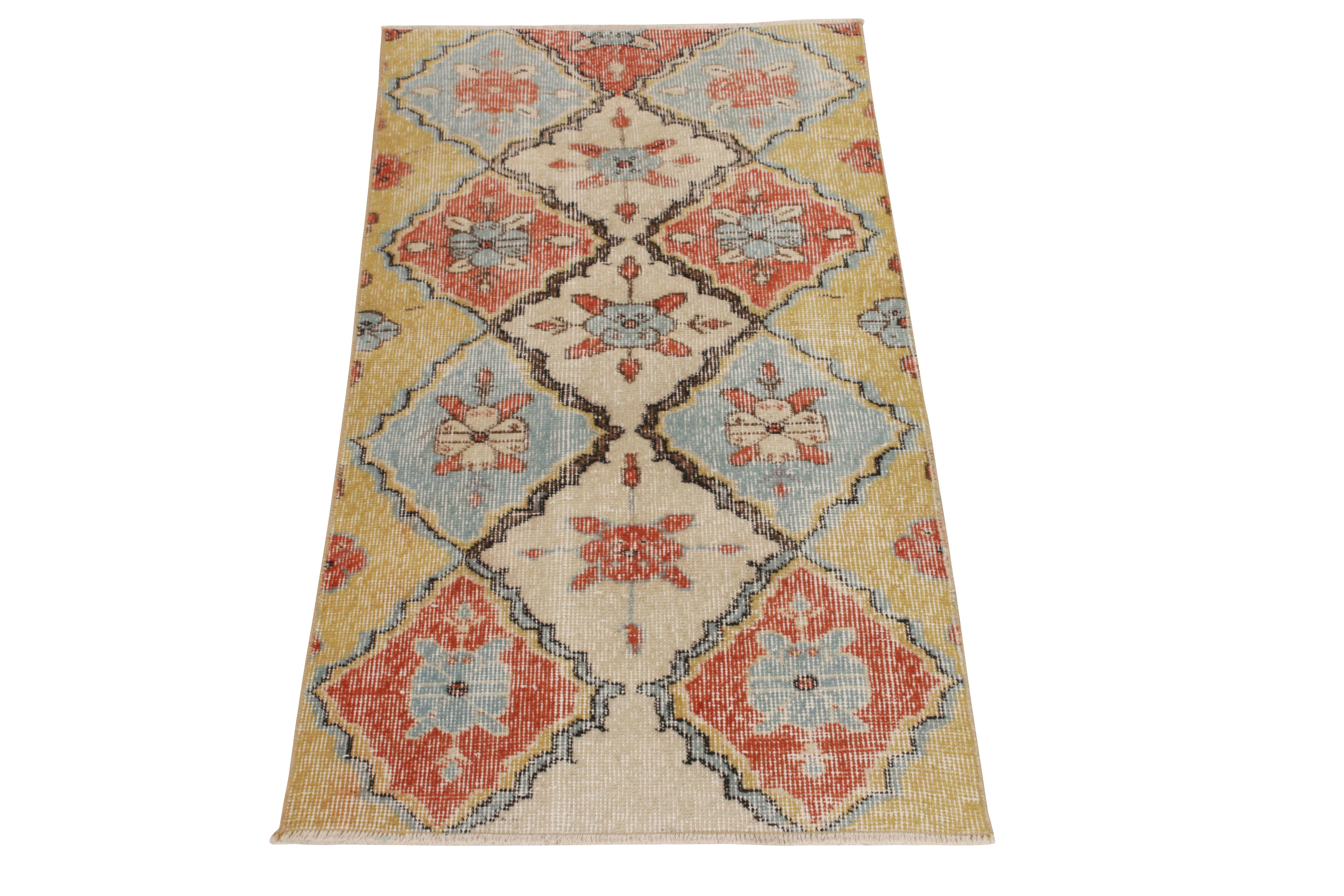 Hand-knotted in wool circa 1950-1960, a 2x5 vintage Deco rug from an acclaimed Turkish designer entering Rug & Kilim’s commemorative Mid-Century Pasha Collection. The vision relishes a series of diamond patterns in bright orange, mustard and canary