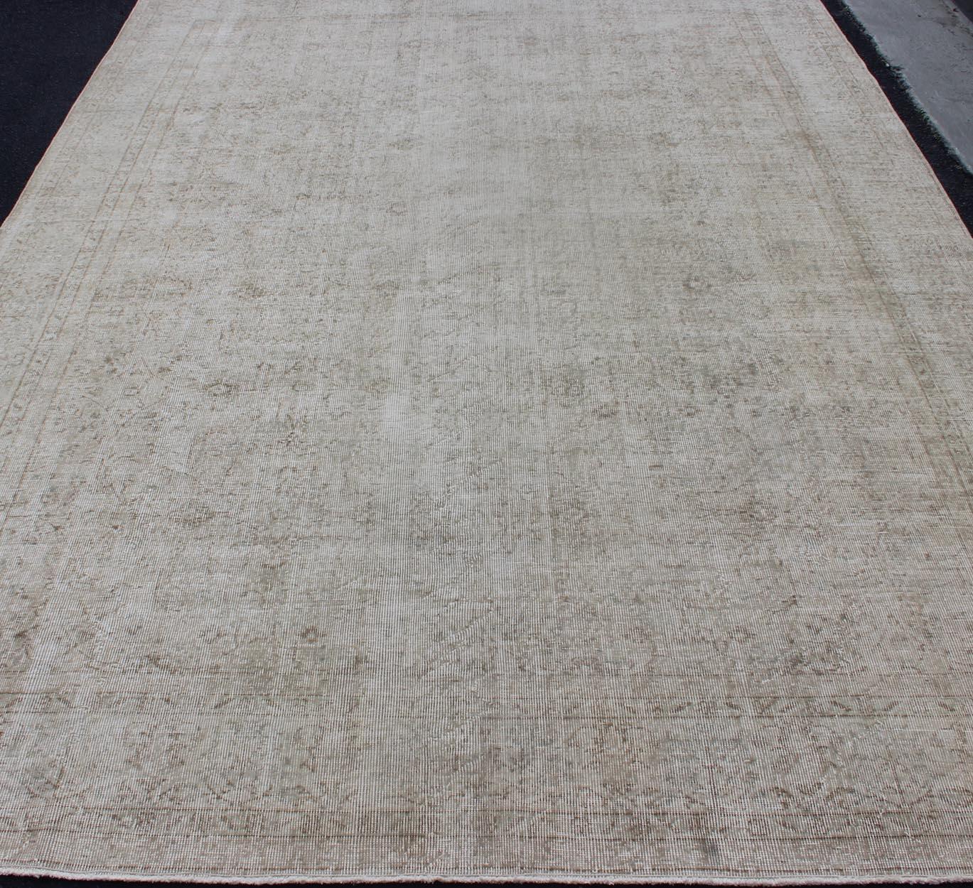 Hand-Knotted Vintage Distressed Turkish Rug with All-Over Pattern in Light Cream, Light Brown For Sale