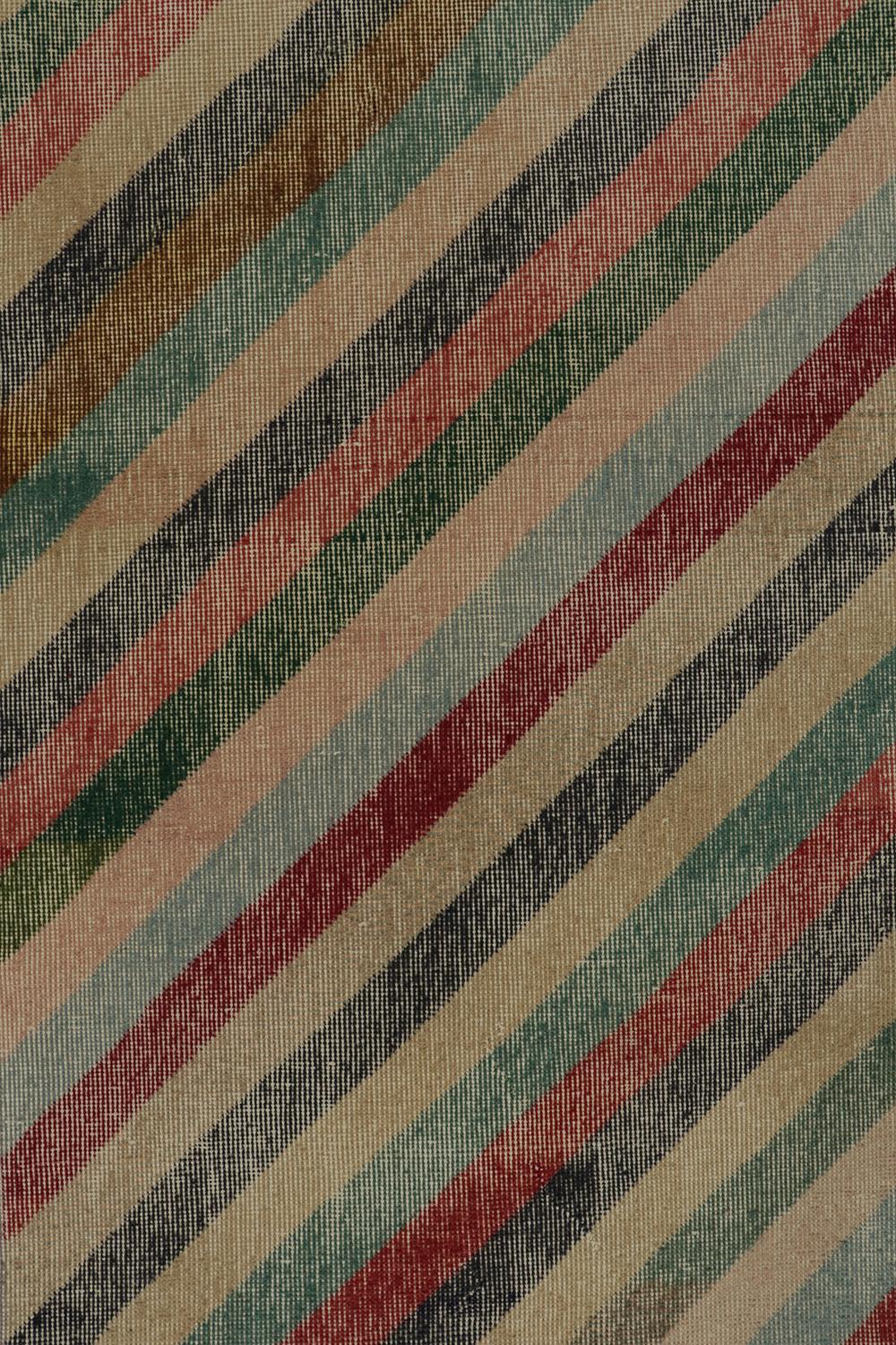 Vintage Distressed Zeki Müren Rug in Polychromatic Stripes, by Rug & Kilim In Good Condition For Sale In Long Island City, NY