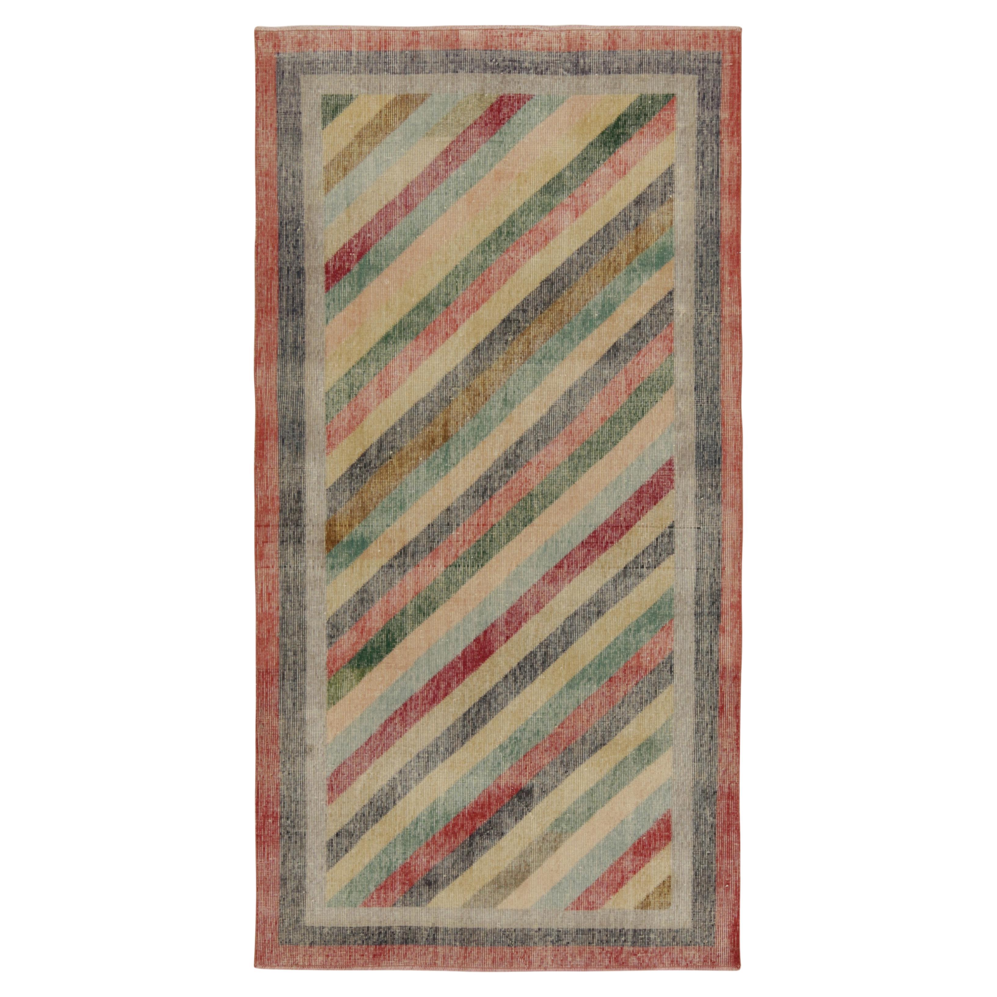 Vintage Distressed Zeki Müren Rug in Polychromatic Stripes, by Rug & Kilim For Sale