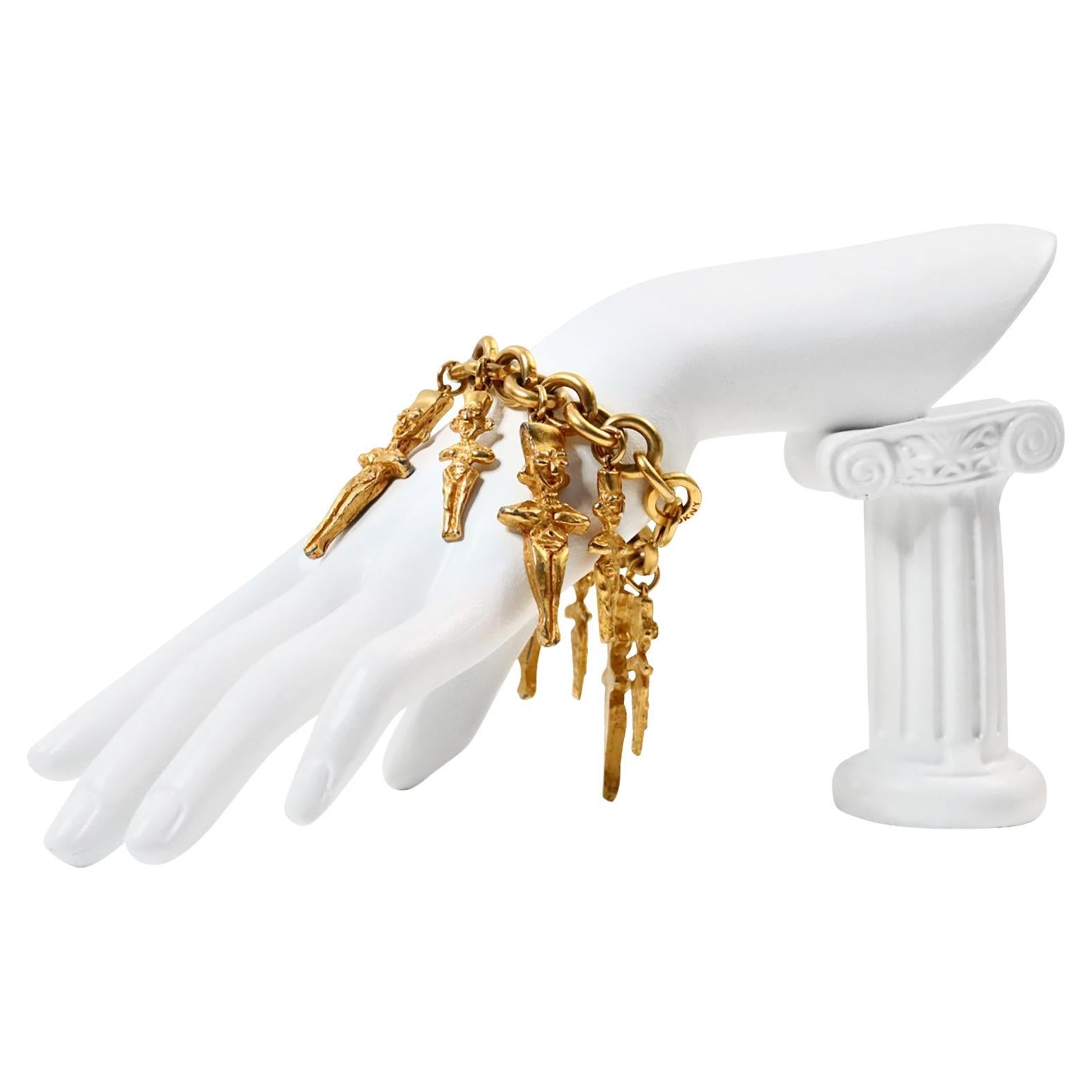 Vintage DKNY Gold Dangling Characters, circa 1980s For Sale