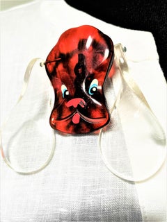 Vintage dog head brooch with big Lucite/acrylic ears from the 1940s USA