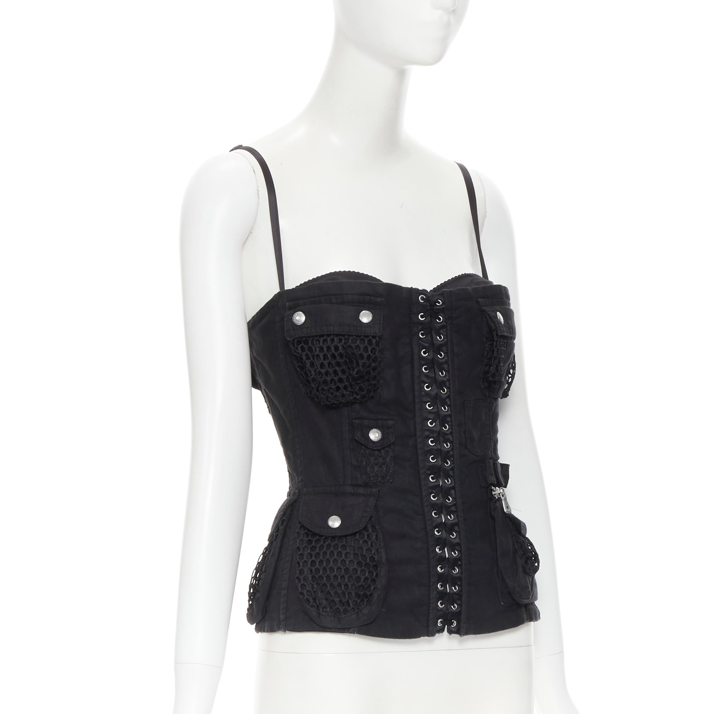 vintage DOLCE GABBANA black cargo mesh military pocket corset bustier top IT42 M 
Reference: TGAS/B01443 
Brand: Dolce Gabbana 
Material: Linen 
Color: Black 
Pattern: Solid 
Closure: Zip 
Extra Detail: Corset laced detailing. Linen polyester. Net