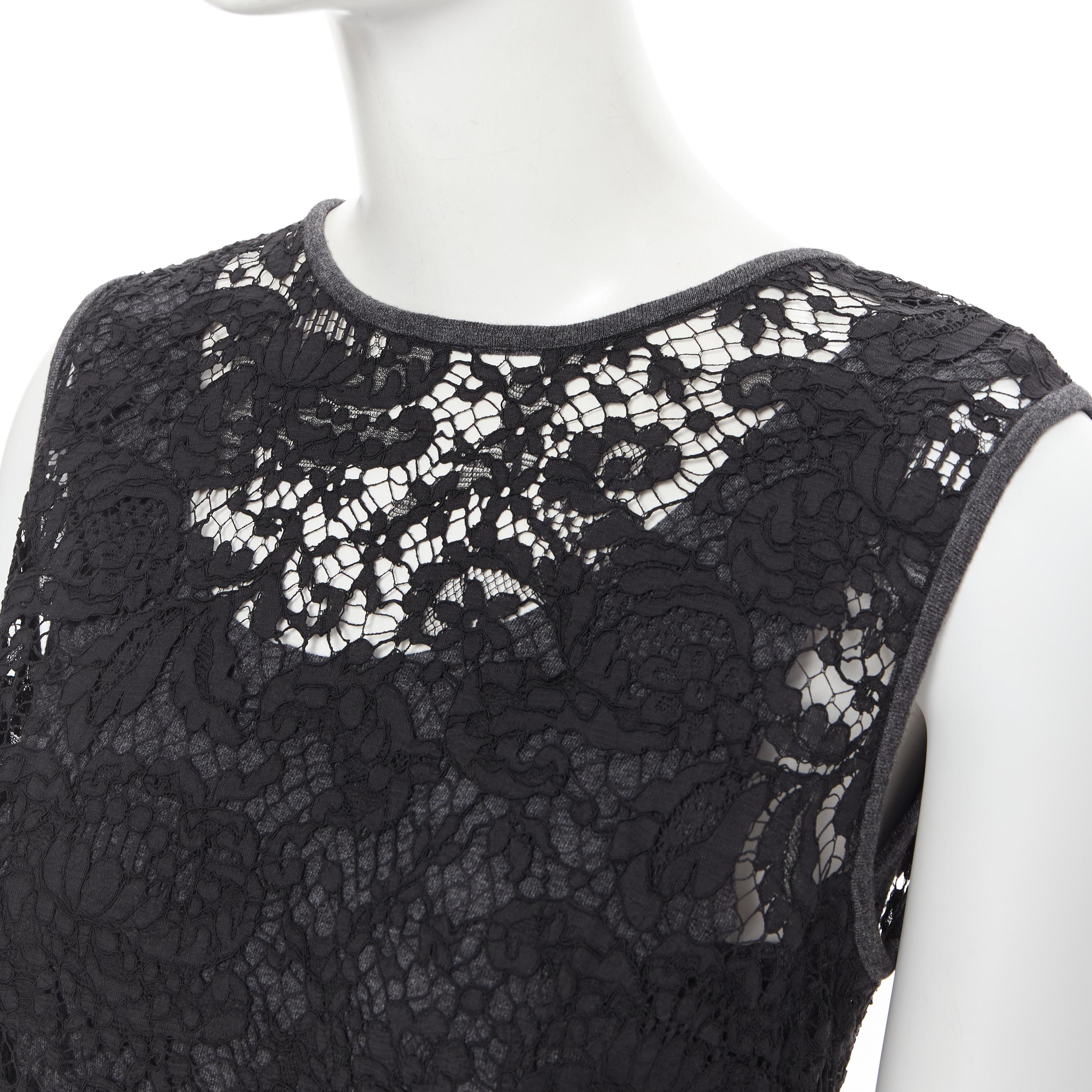 vintage DOLCE GABBANA black floral lace grey jersey lined cocktail dress IT42 M 
Reference: GIYG/A00025 
Brand: Dolce Gabbana 
Material: Cotton 
Color: Black 
Pattern: Floral 
Closure: Zip 
Extra Detail: Floral lace upper. Grey jersey trimming. Grey
