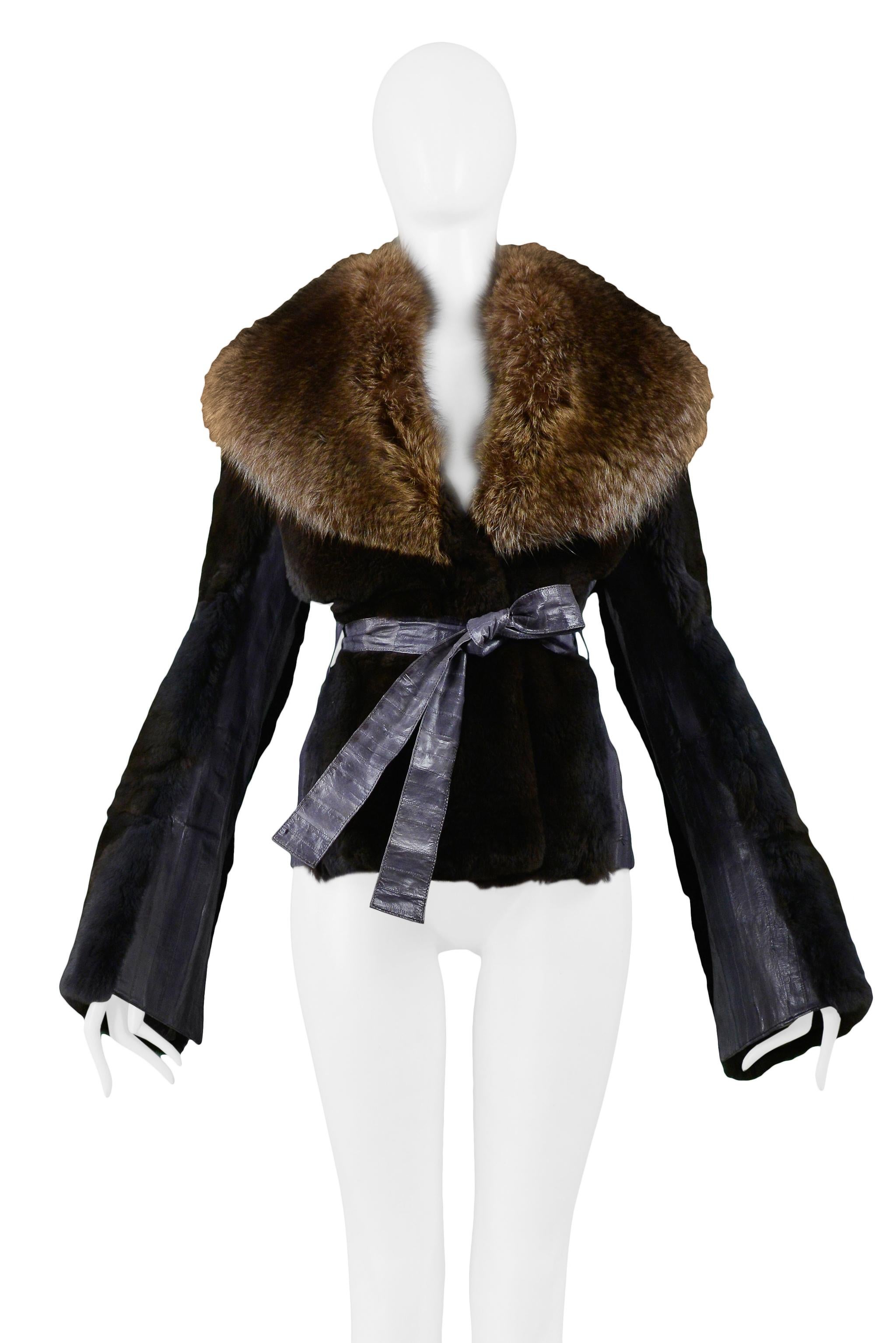 Resurrection Vintage is excited to offer a vintage Dolce & Gabbana dark brown mink fur jacket featuring a dramatic oversized brown fur collar, leather waist belt, and flared sleeves with leather inset panel. 

Dolce & Gabbana
Size 40
Measurements: