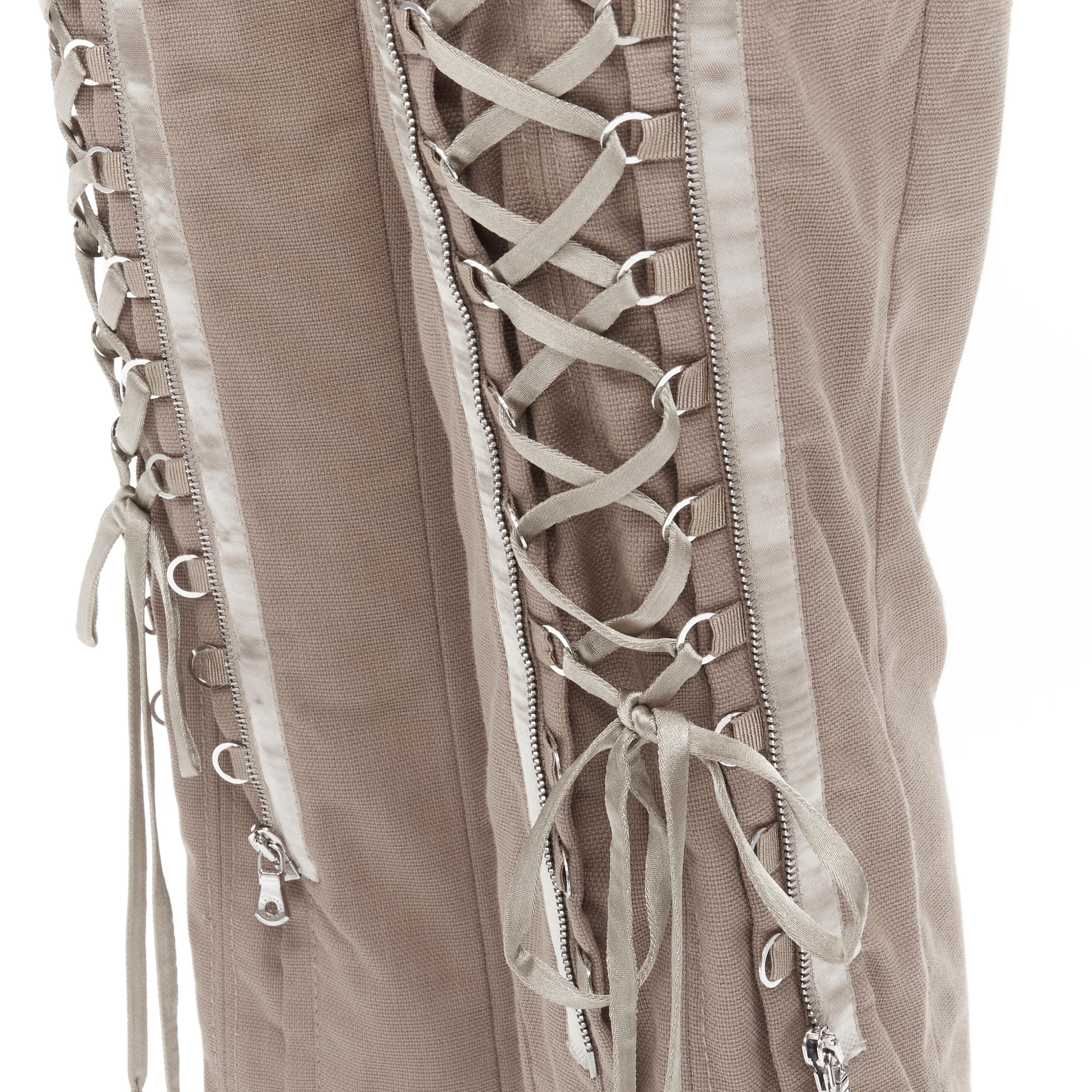 vintage DOLCE GABBANA khaki green ribbon corset lace up cropped pants IT40 S 
Reference: TGAS/B01882 
Brand: Dolce Gabbana 
Material: Cotton 
Color: Brown 
Pattern: Solid 
Closure: Zip 
Extra Detail: Silk ribbon trimming. Corset lace up front. Zip