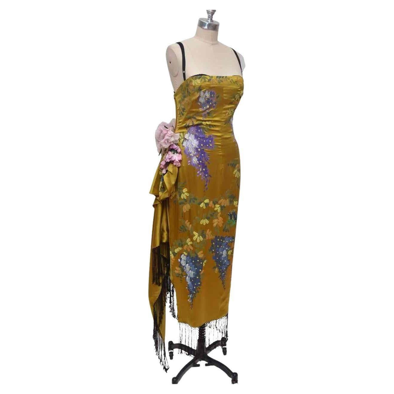 Dolce Gabbana Yellow Gold silk dress 1998  Hand-painted with flowers and birds and flowers on the side. 
Condition is very good Pictured on mannequin size 4-6 US.No size label. 
Mannequin waist is about 27