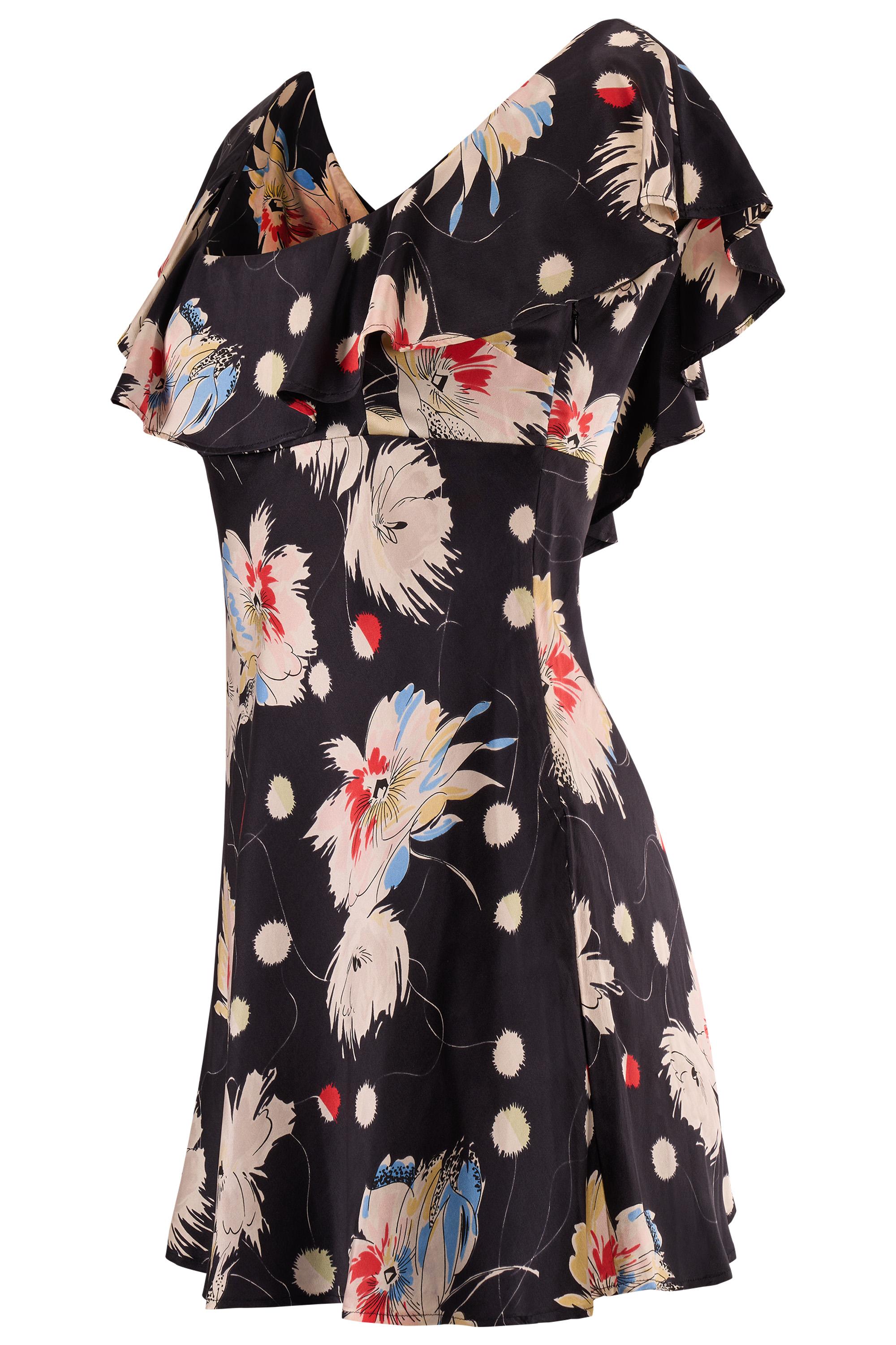 Vintage Dolce&Gabbana mini dress from the 1995 collection. Features a striking black backdrop adorned with bold, painterly floral prints in shades of cream, red, blue, and soft green. The sweetheart neckline is enhanced with soft ruffles and flutter