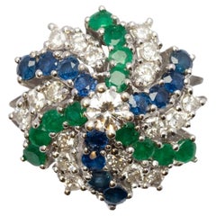 Vintage dome shaped multicoloured ring emerald sapphire diamonds white gold