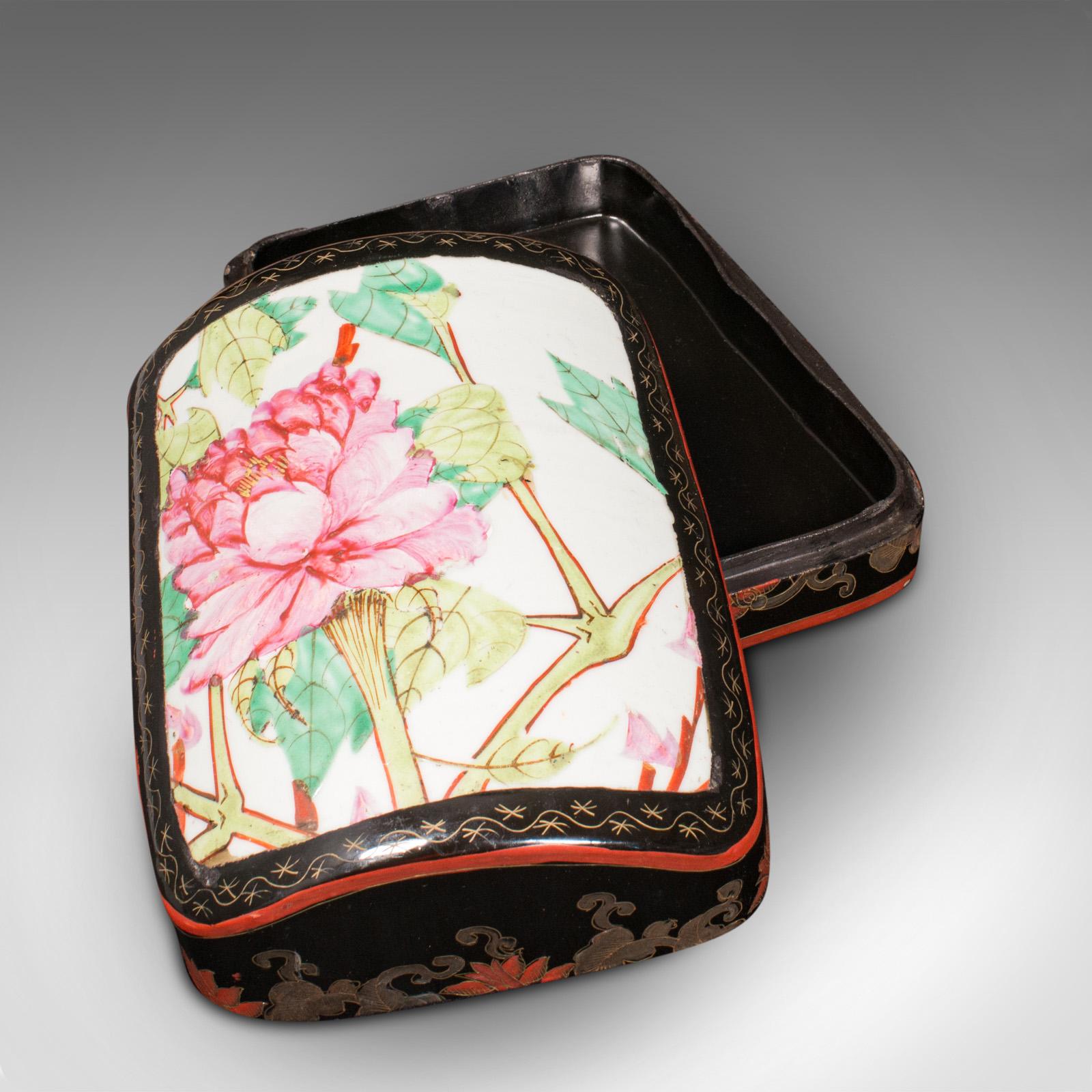 This is a vintage dome top box. An Oriental, japanned hardwood and enamel trinket or jewellery case, dating to the late Art Deco period, circa 1940.

Delightfully decorative small box with distinctive form and finish.
Displays a desirable aged