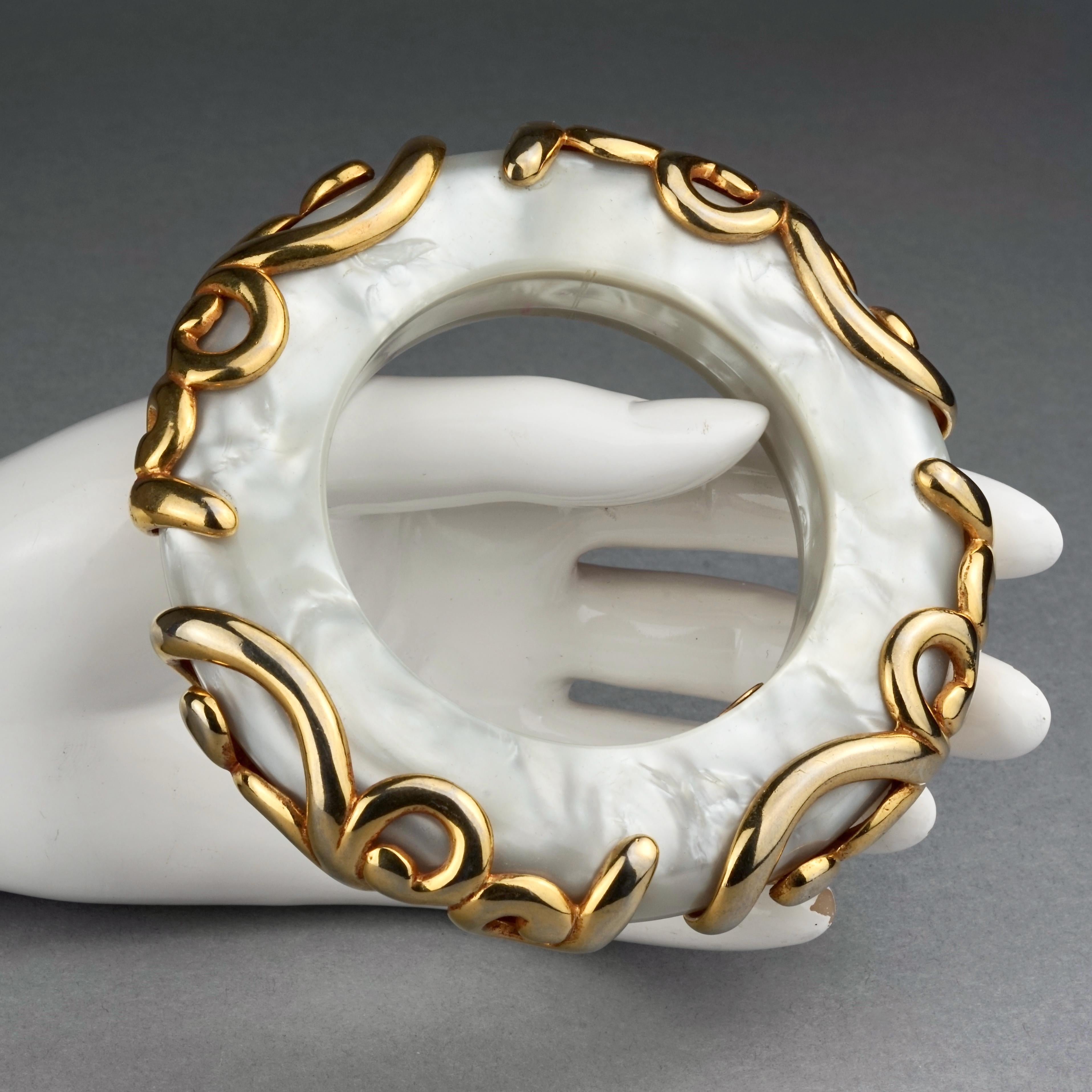 Vintage DOMINIQUE AURIENTIS Gilt Swirl Mother of Pearl Resin Bangle Bracelet For Sale 3