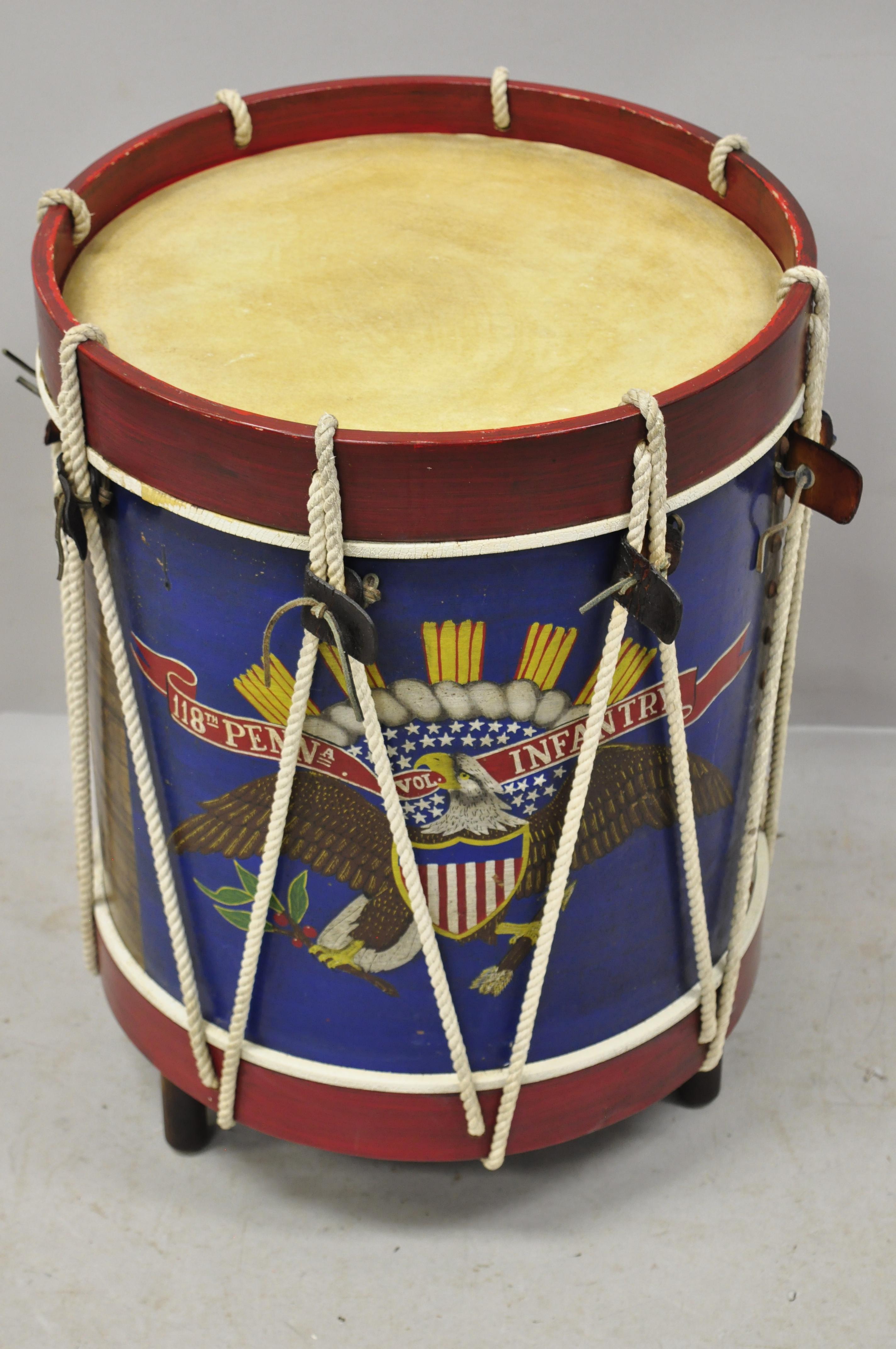 Vintage Don Maley Patriot Patriotic Army drum military wood side end table. Item features hand painted patriotic details, raised on wooden feet, solid wood construction, original signature, very nice vintage, circa 1980s. Measurements: 23