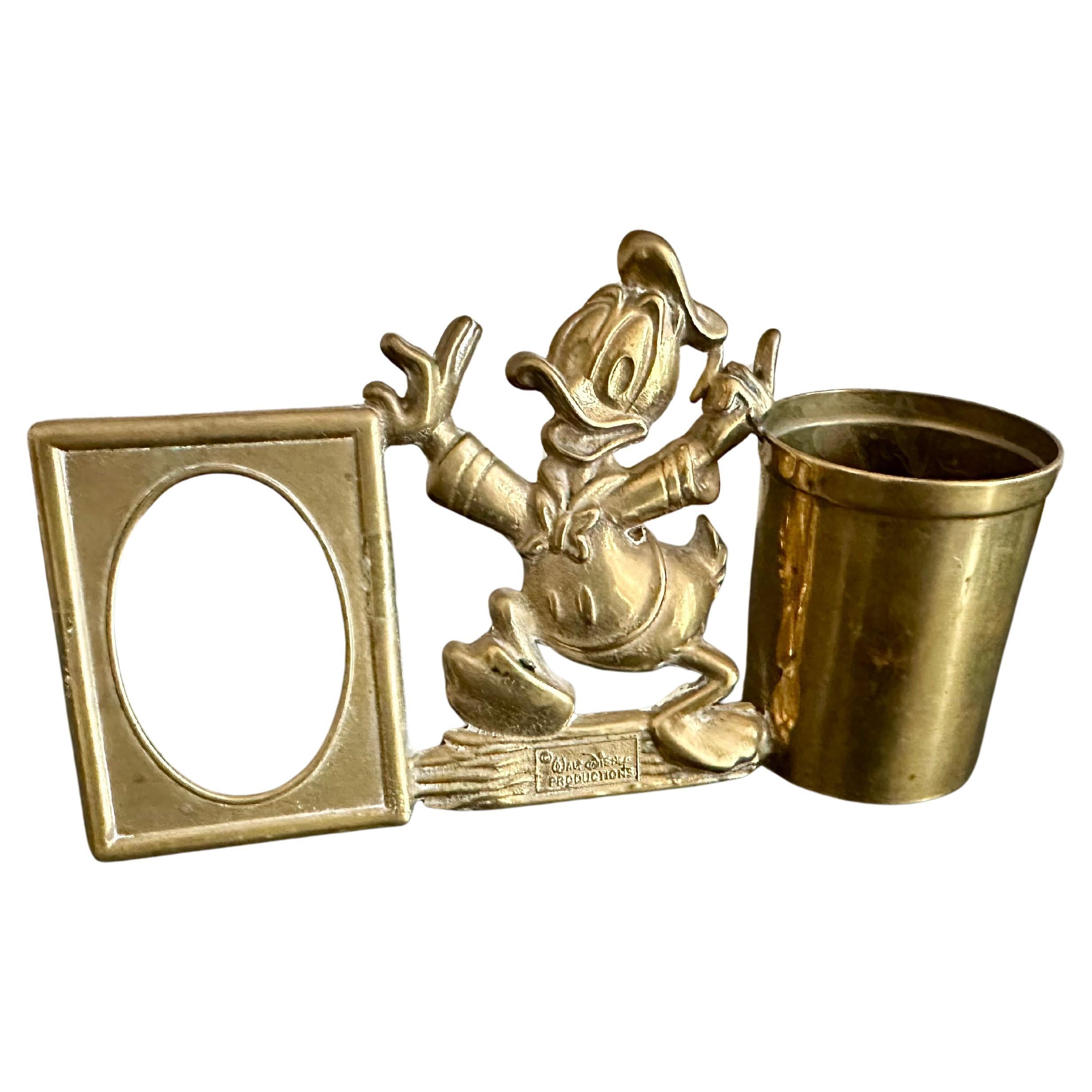 Portapenne vintage in ottone di Paperino con cornice - 1970's Collectial