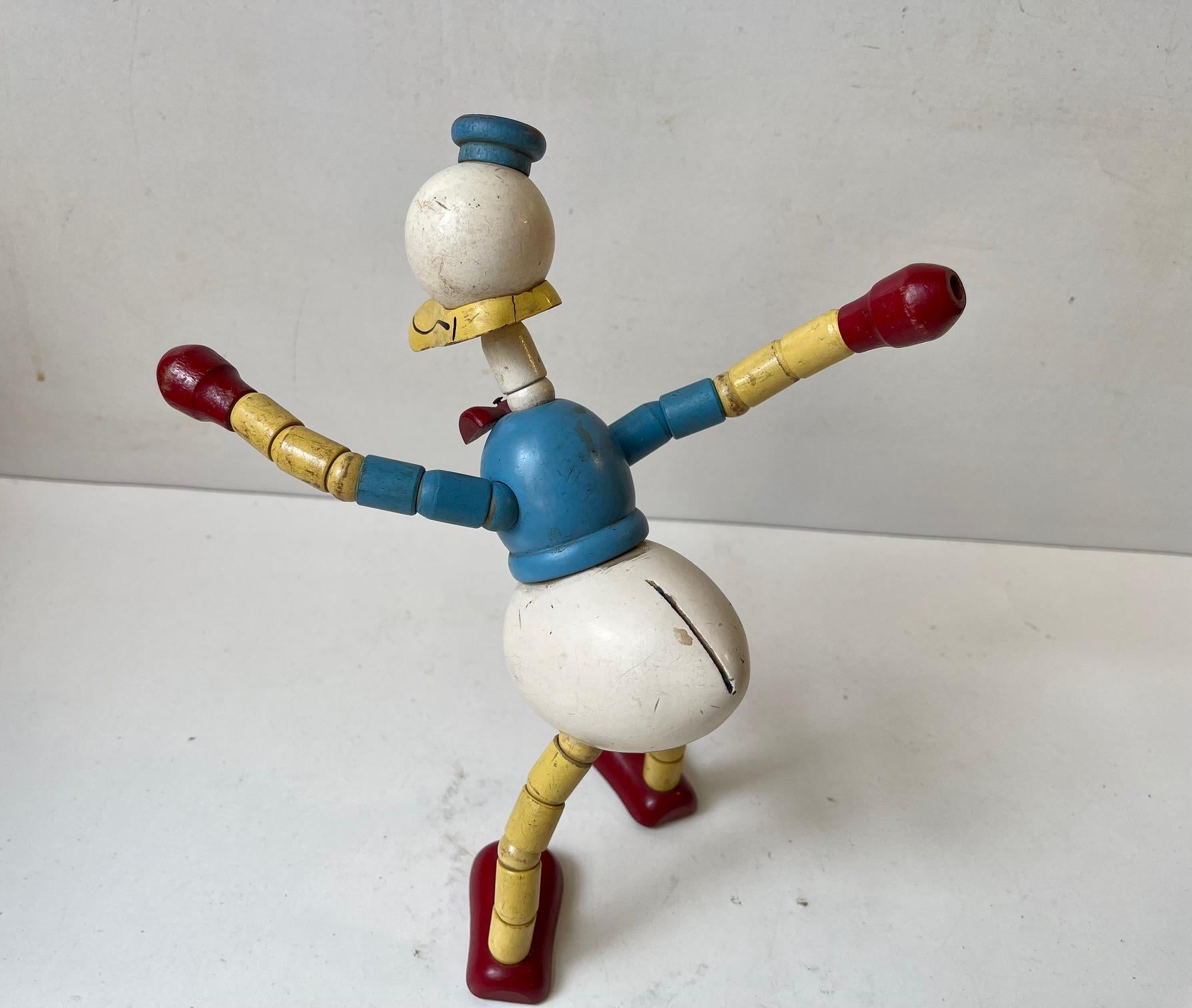 Swedish Vintage Donald Duck in Painted Beech with Articulated Limbs by Brio Sweden