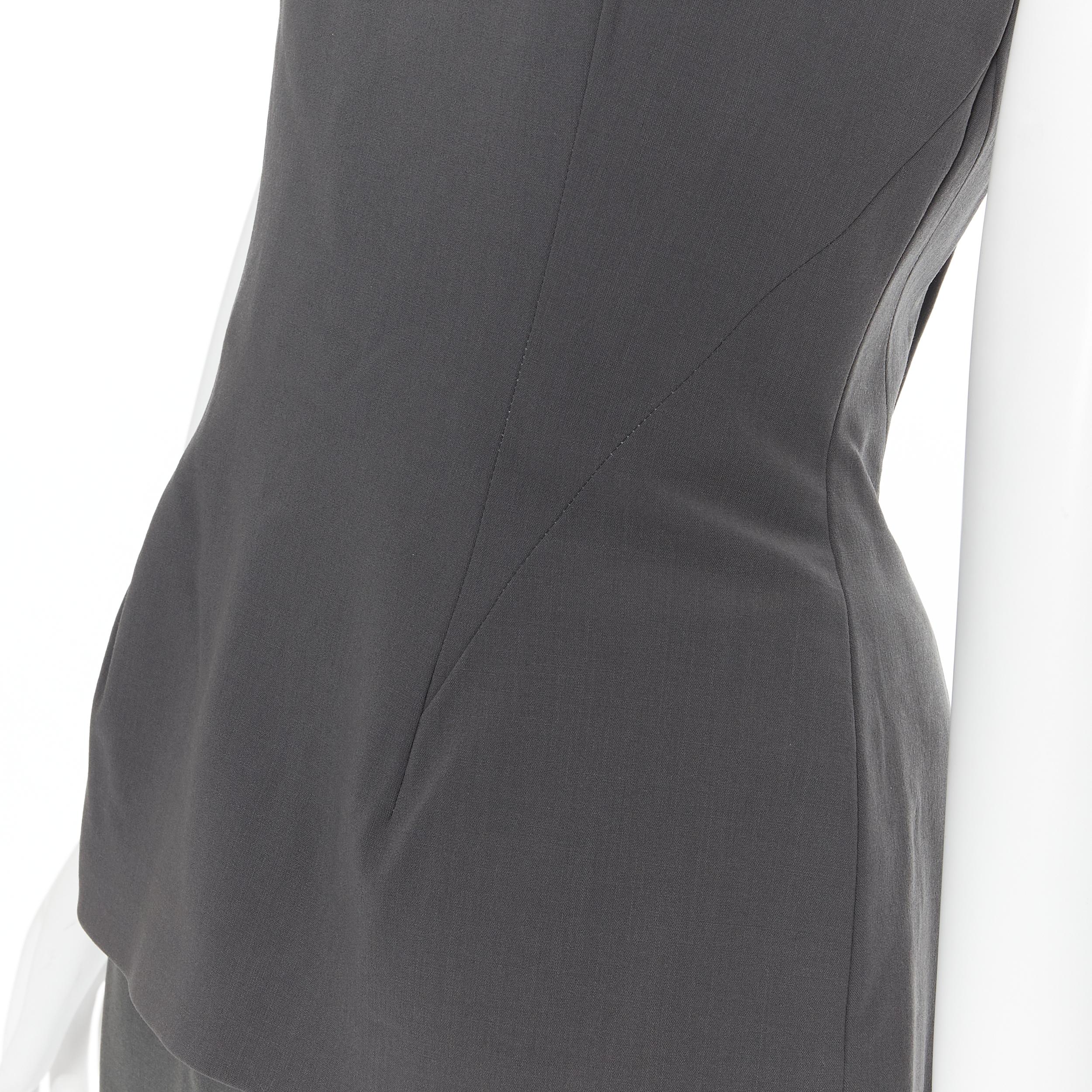 vintage DONNA KARAN grey crepe boned strapless bustier skirt set US6 M 
Reference: GIYG/A00058 
Brand: Donna Karan 
Designer: Donna Karan 
Material: Wool 
Color: Grey 
Pattern: Solid 
Closure: Zip 
Extra Detail: This top comes with the complimentary