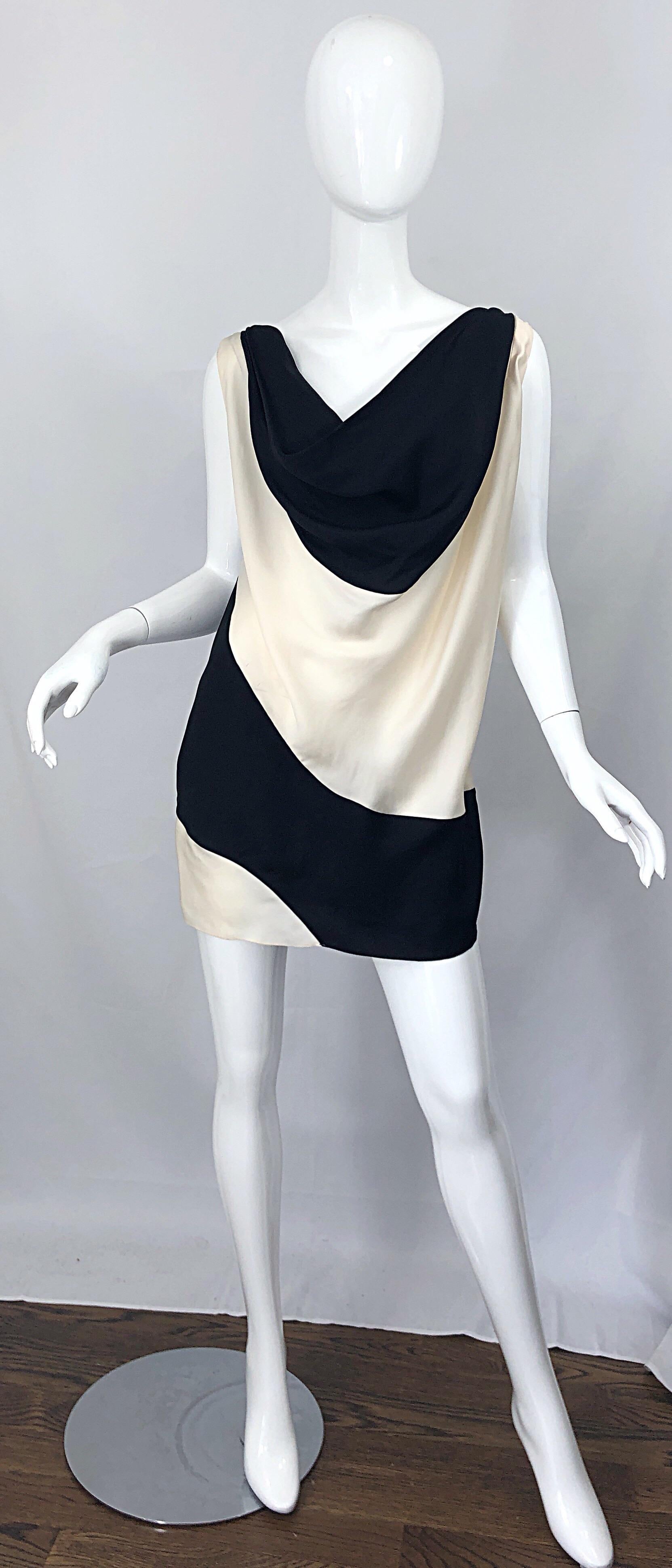 Sensational brand new vintage deadstock 1990s  with original tags $1,700 DONNA KARAN Collection black and white / ivory color block luxurious soft cupro tunic top / mini dress! Cupro is a rare fabric only used for the finest of designers, especially