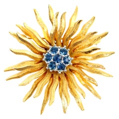 Vintage D'orlan Gold Starburst with Blue Diamante Set in Silver Circa 1980s