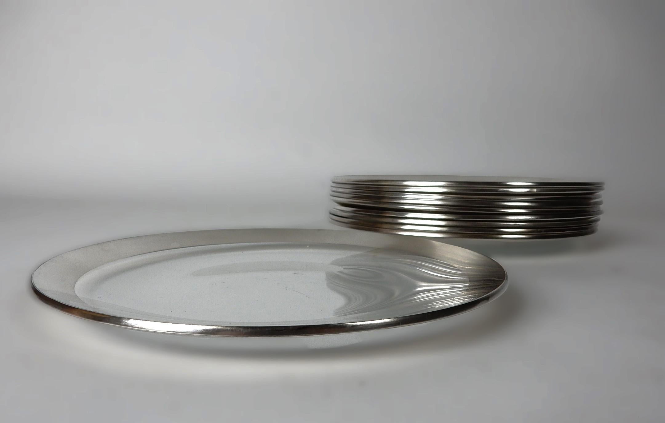 A set of 10 Dorothy Thorpe design 8in salad or desert plates with a 1/2in sterling silver banded edge.
These show some pre-owned use but still very presentable.  