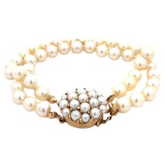 Bracelet vintage à double rangée de perles avec fermoir grappe