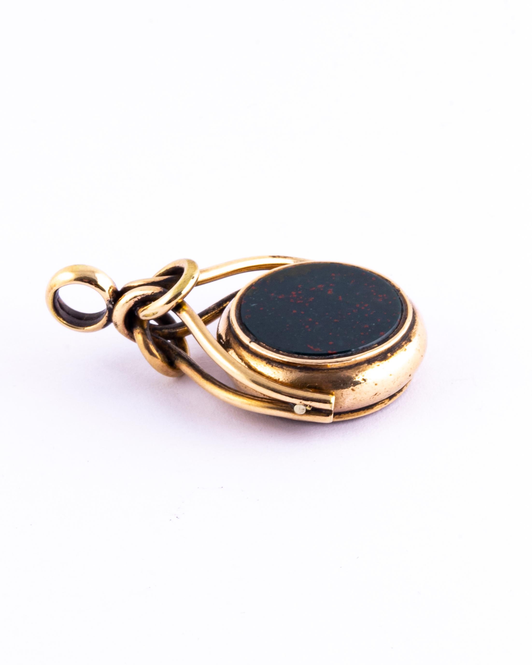 This swivel fob can be used as the perfect pendant. The two stones that are in this fob are held in place with 9ct gold and the loop is modelled in the style of looped cord. These stones are deep rich sardonyx and bloodstone with gorgeous red flecks