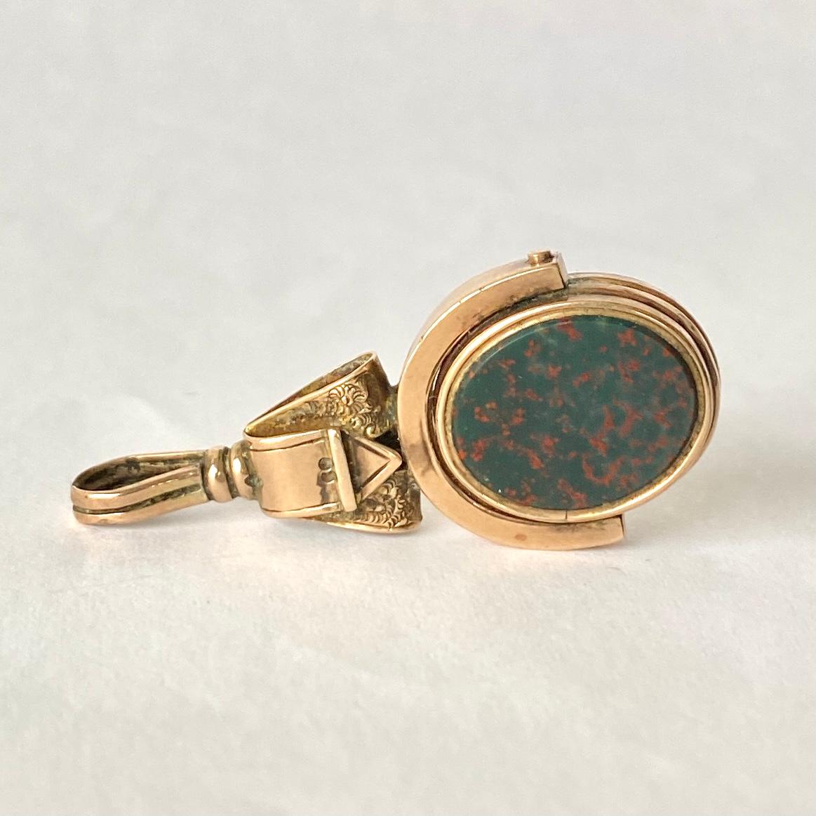This swivel fob can be used as the perfect pendant. The two stones that are in this fob are held in place with 9ct gold. These stones are deep rich sardonyx and bloodstone with gorgeous red flecks running through it. 

Stone Dimensions: