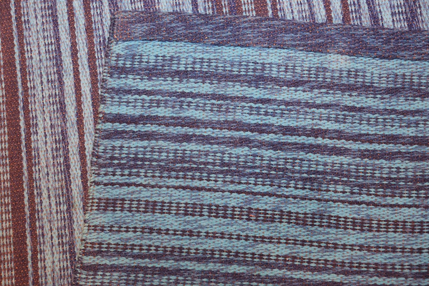 Vintage Double Sided Blue Background Swedish Kilim Rug, Country Of Origin: Sweden, Circa Date: Mid 20th Century. Size: 6 ft 5 in x 9 ft 8 in (1.96 m x 2.95 m)

