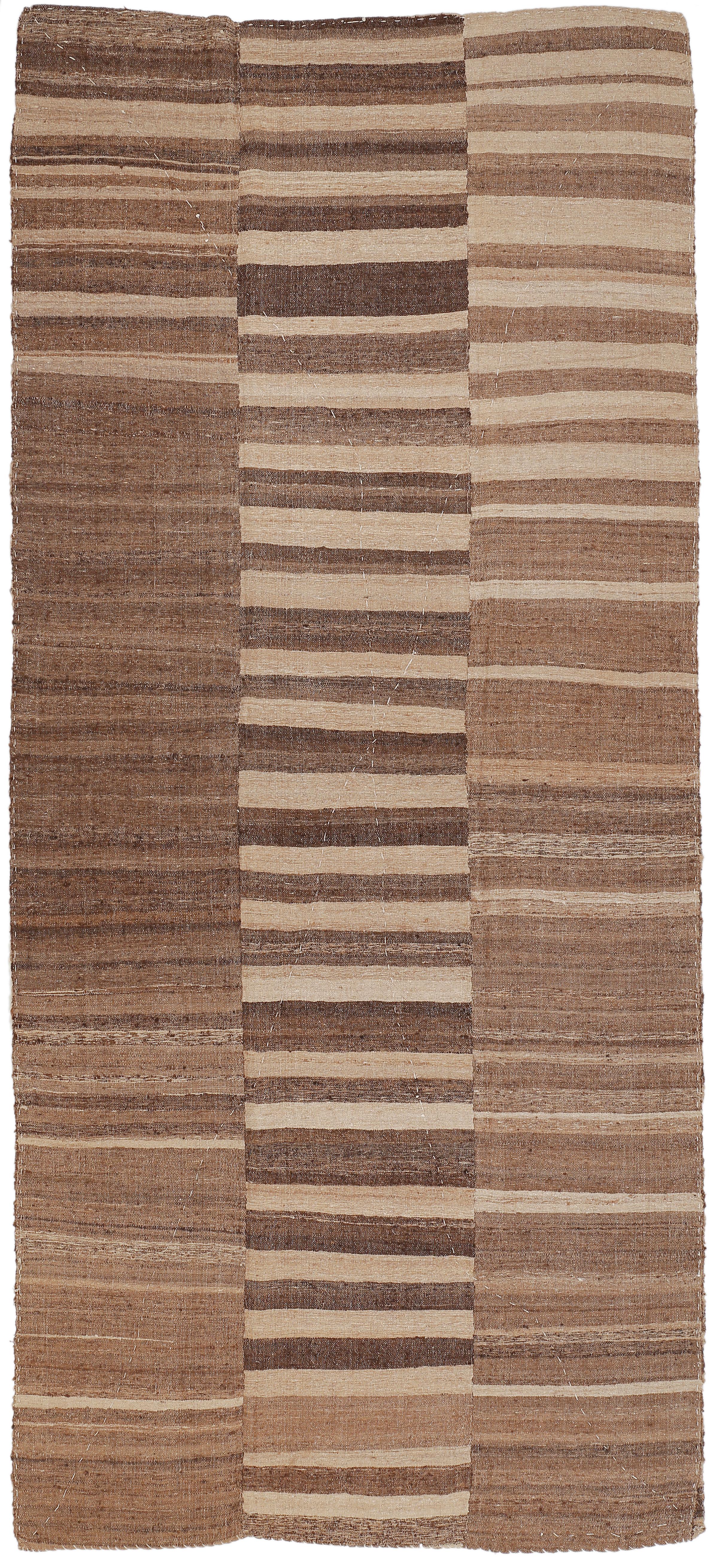 Double-sided covers of this type are called lahaf, and are typically woven with natural, undyed wool on three narrow panels, with each side displaying an asymmetric combination of horizontal stripes alternated to open fields. The two sides are then