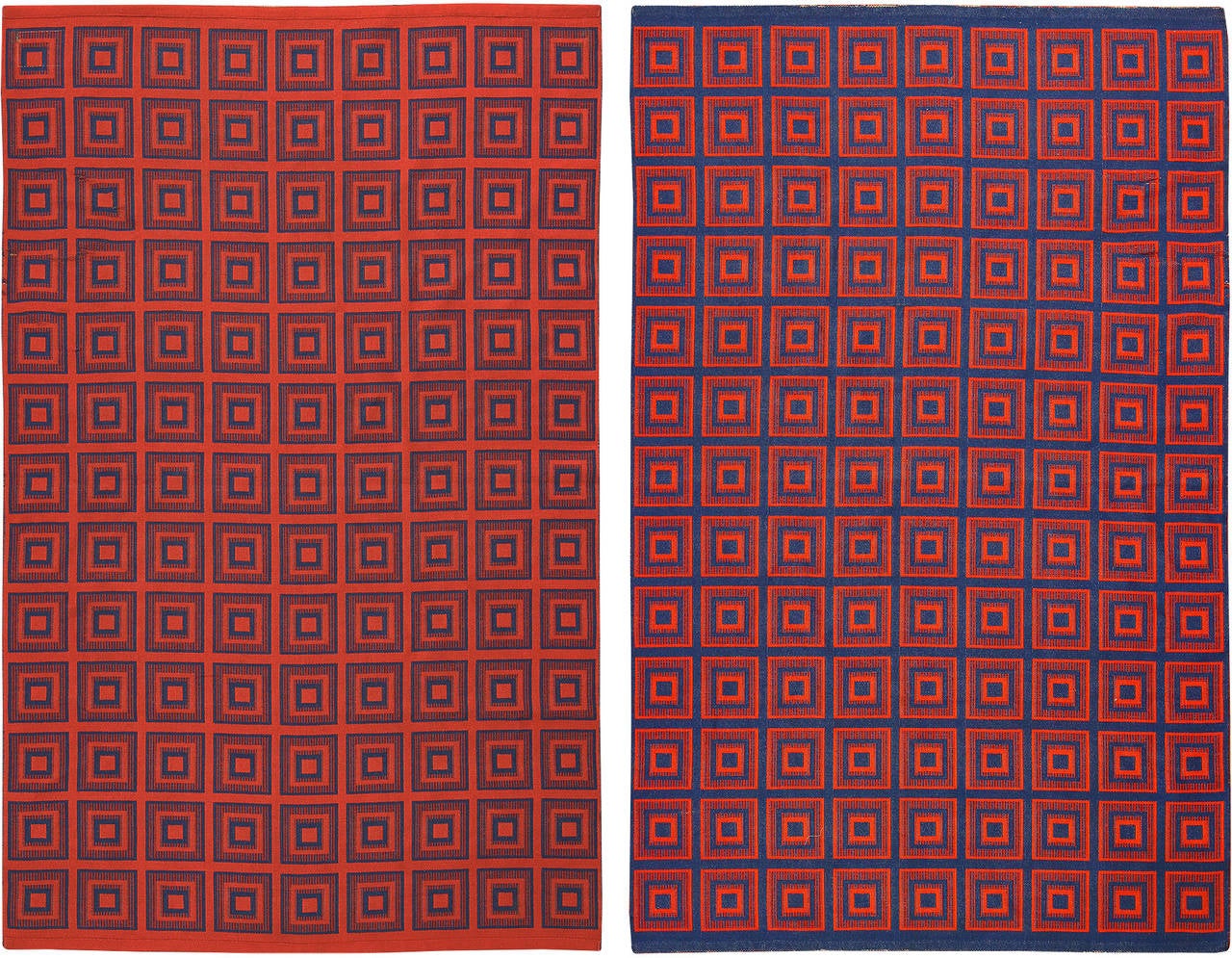 Double-sided Kilim, Sweden, circa 2000. Size: 5 ft x 7 ft 8 in (1.52 m x 2.34 m)

This pop art-esque double sided Swedish kilim owes it’s design to Scandinavian tradition. A hypnotic pattern dominates the piece; a series of red-orange and cerulean