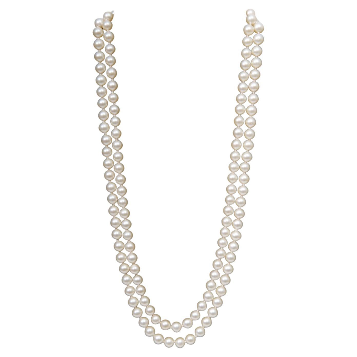 Collana di perle lunga a doppio filo vintage con chiusura di perle e strass