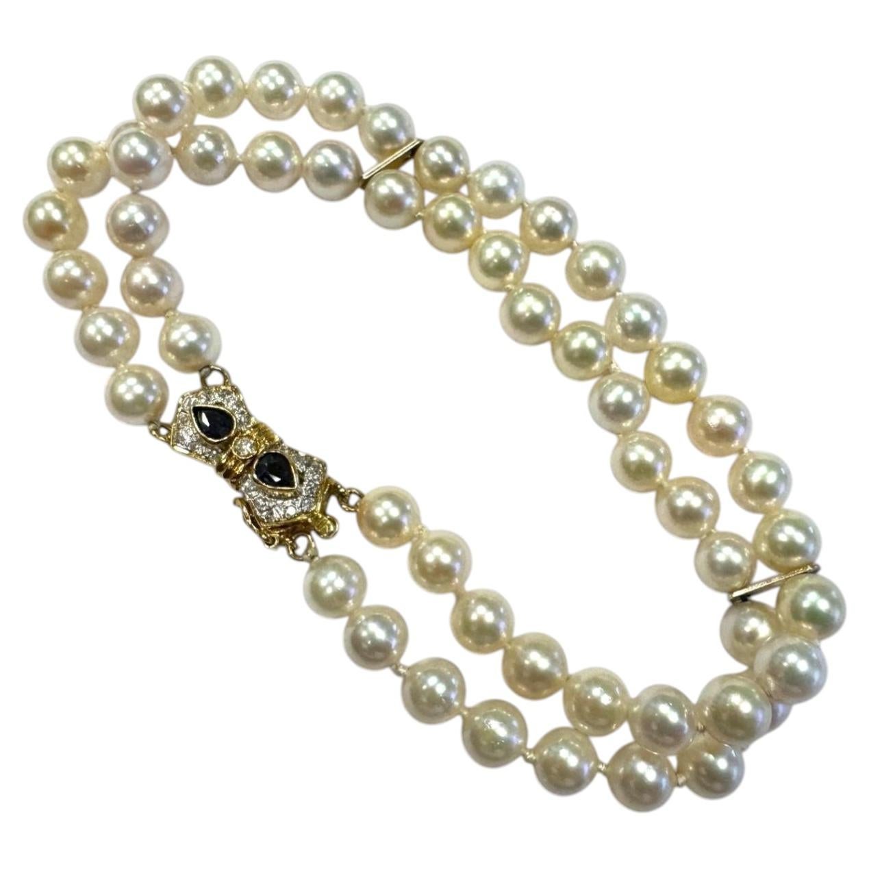 Bracelet vintage à double rangée de perles, saphirs et diamants, en or jaune 14 carats