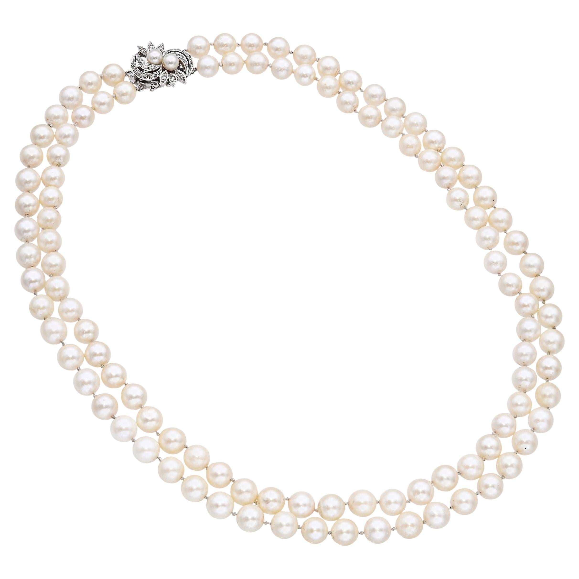 Collar vintage de perlas de doble vuelta con cierre de oro blanco y diamantes
