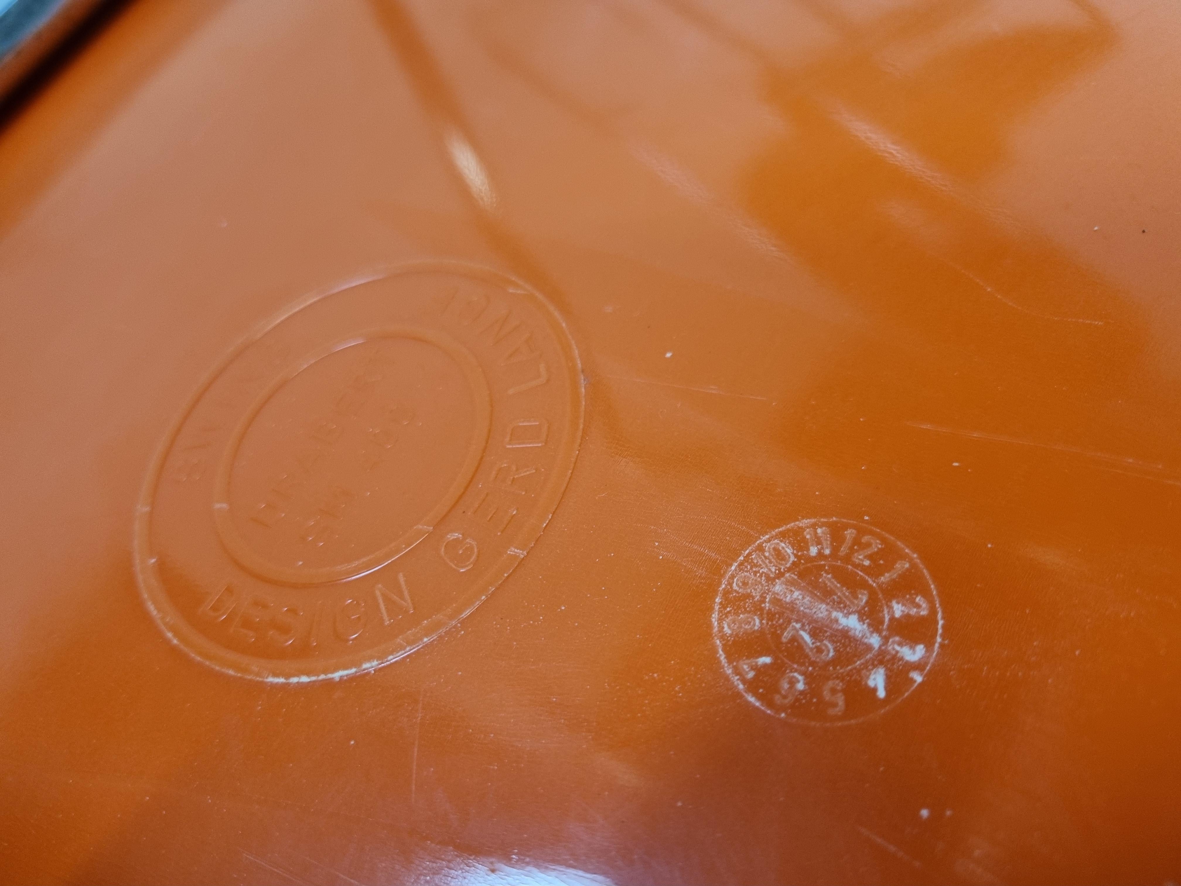 Set of 6 orange 1970s model DrabertSM400 stacking chairs by Gerd Lange.

They consist of plastic sheels mounted on a chromed metal frame.

The chairs are stamped with designer's name and dated 1972.

1970s - Germany

Dimensions:
Height: