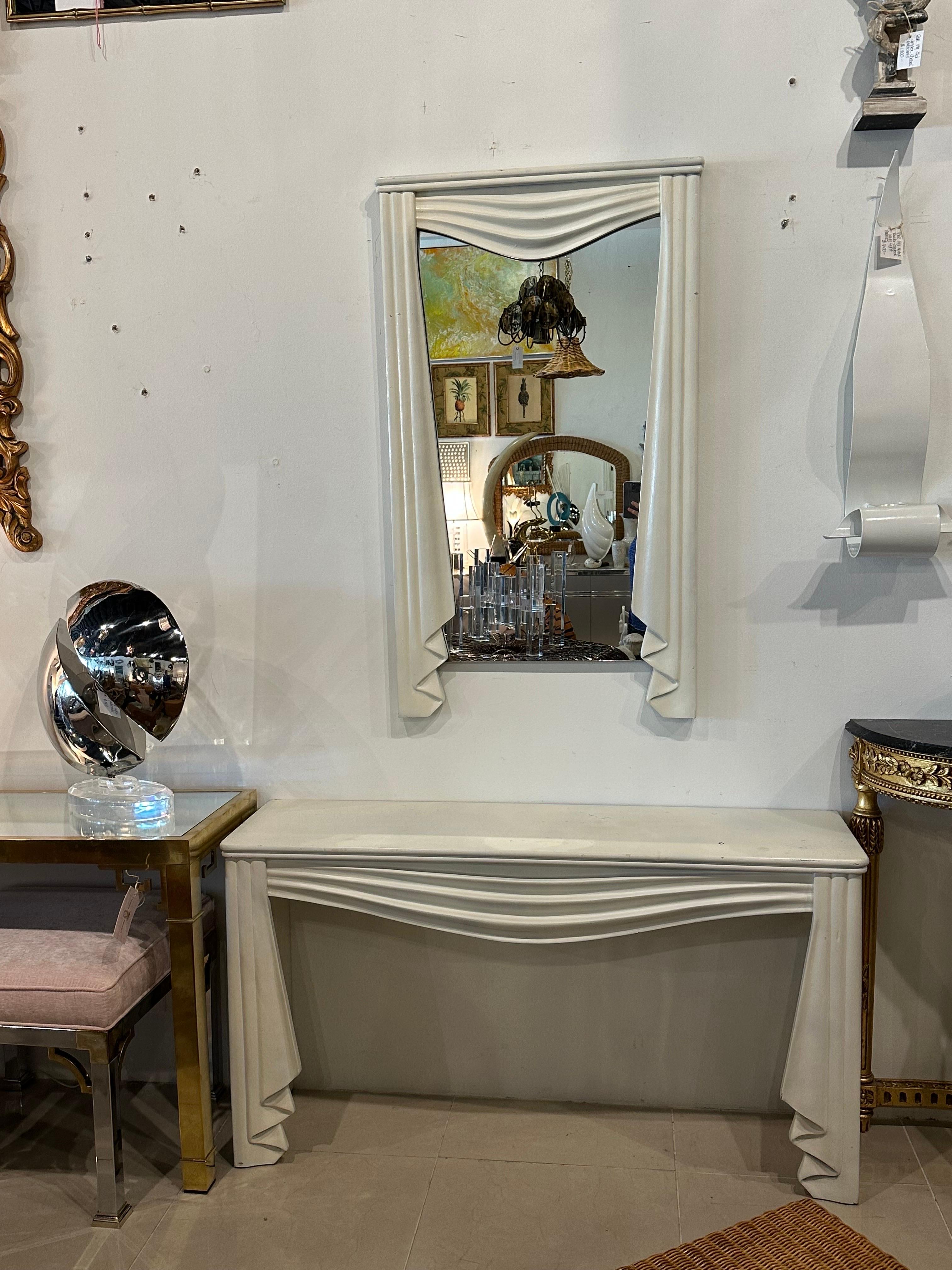 Amazing vintage wrapped swag console table and matching wall mirror. In the style of Dorothy Draper. These have the original, as found finish and will need to be refinished, lacquered or painted. Please see photos. Such amazing curves! Dimensions: