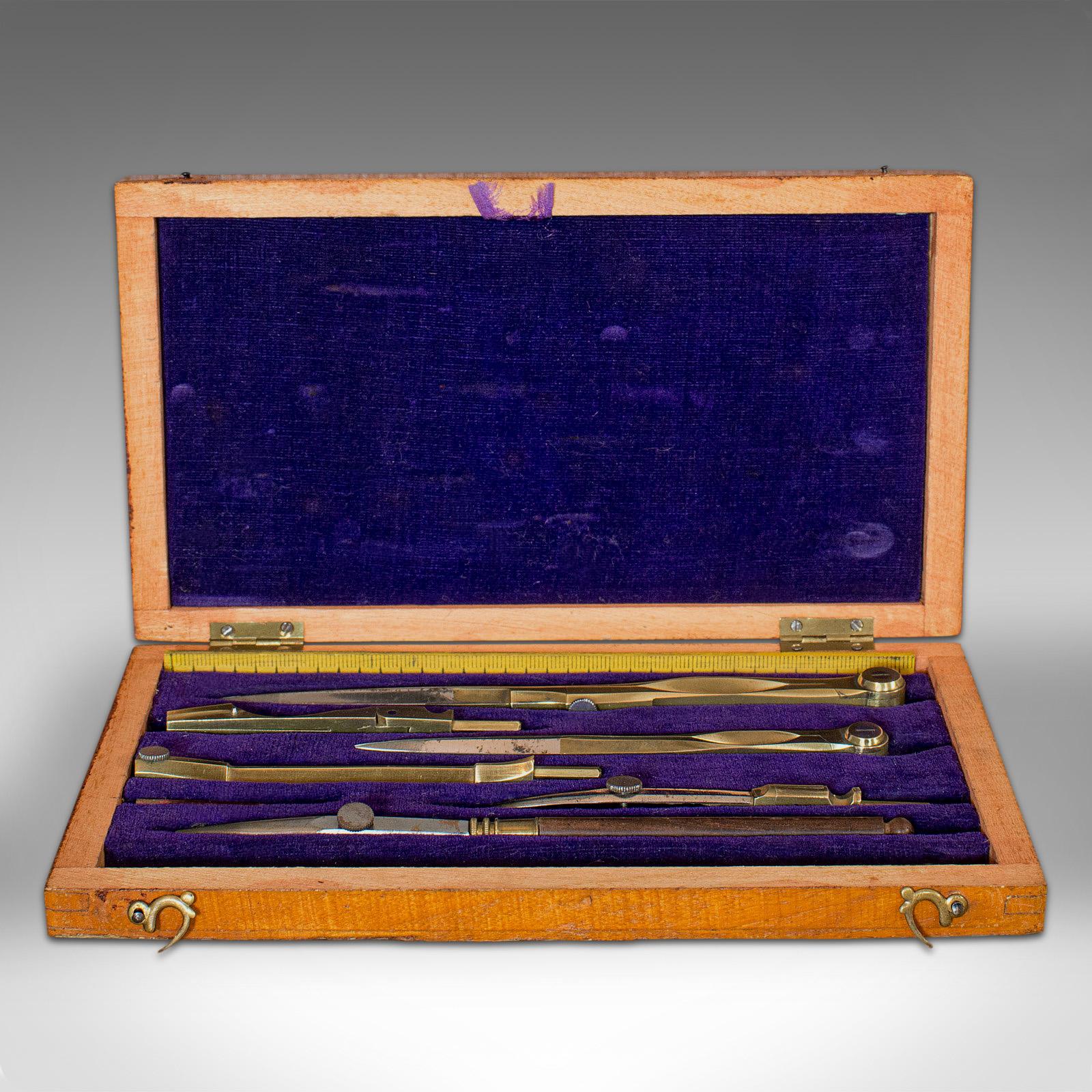 This is a vintage drawing set. An English, boxed draughtsman's or cartographer's instrument compendium, dating to the mid-20th century, circa 1950.

Vintage precision tools
Displays a desirable aged patina
Wooden carry case shows fine grain