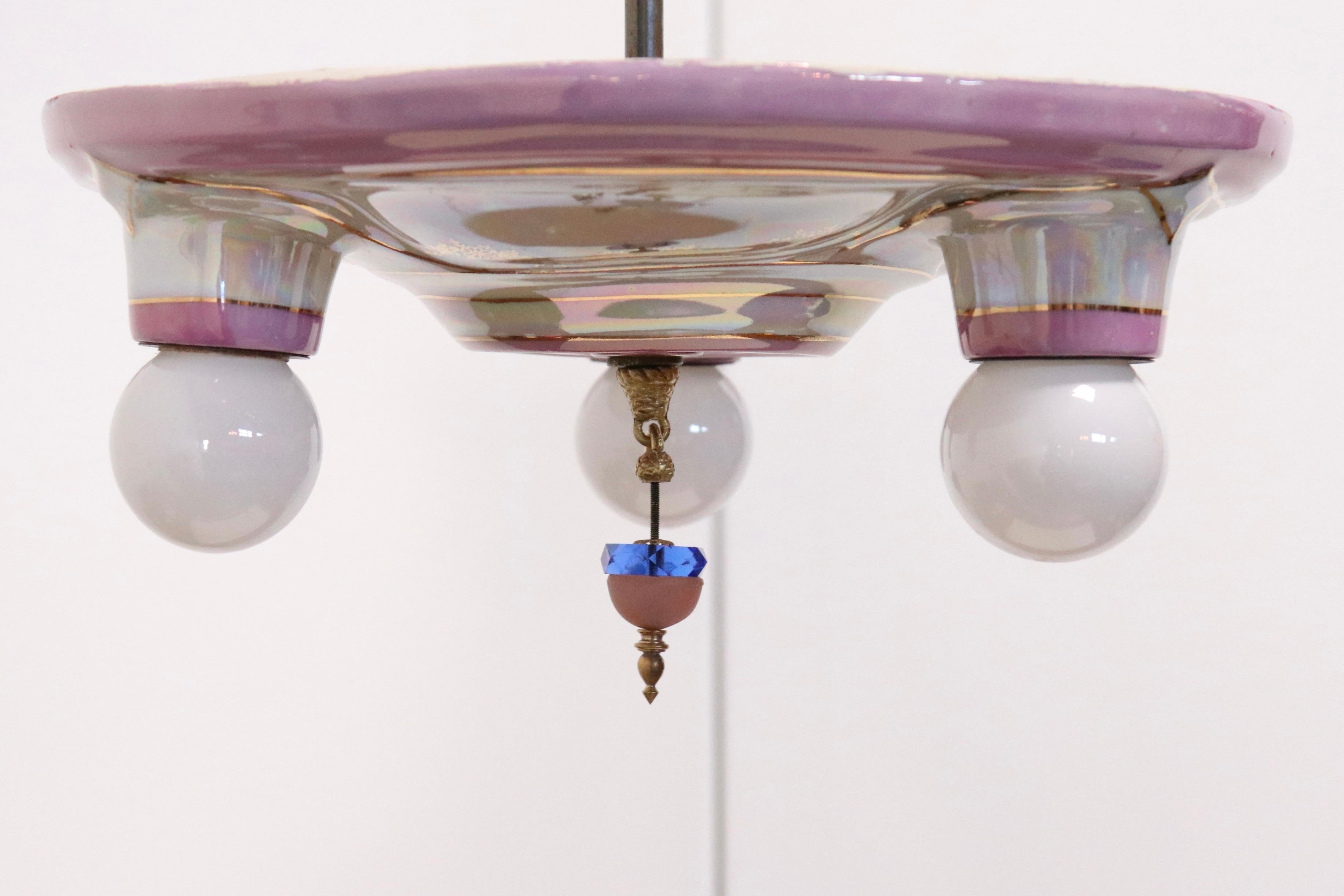 pink and gold light fixture