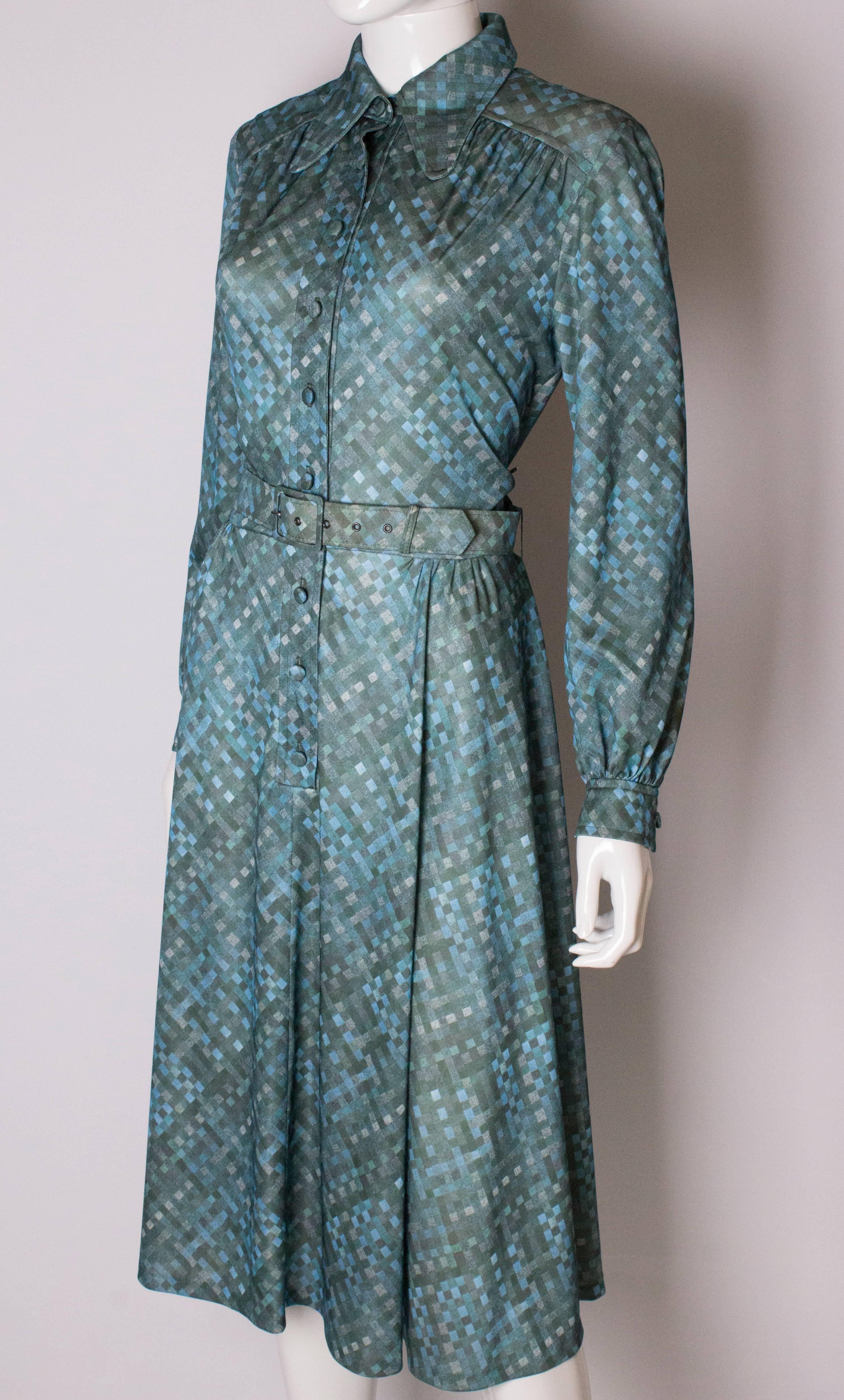 Gray A vintage 1970s green printed day dress by Carnegie London 