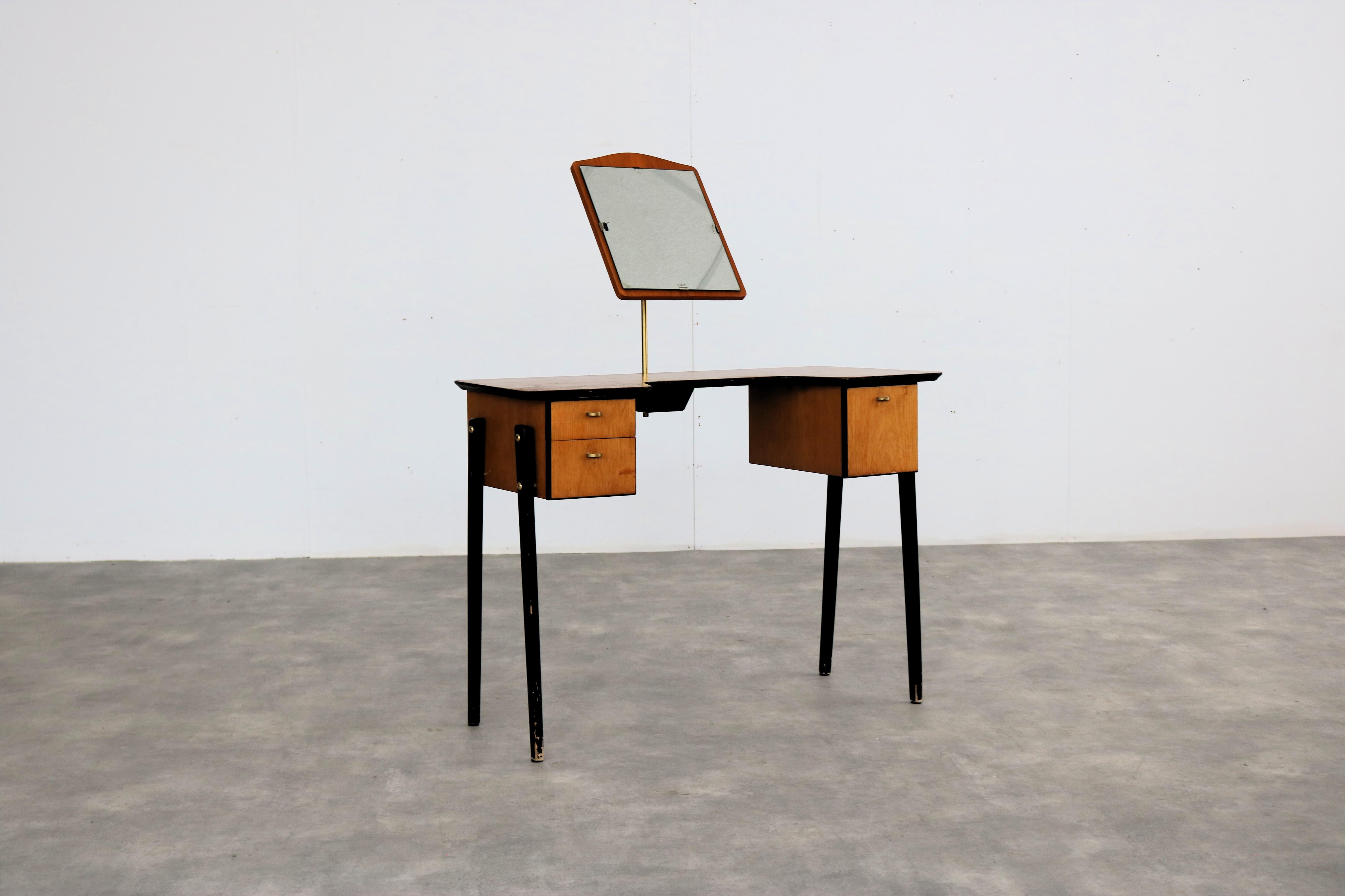 vintage dressing table  cabinet  1960s  Swedish

period  1960s
design  unknown  Sweden
condition  good  minor signs of use
size  113 x 94 x 40 (hxbxd) 

details  teak; brass; glass;

item number  2846