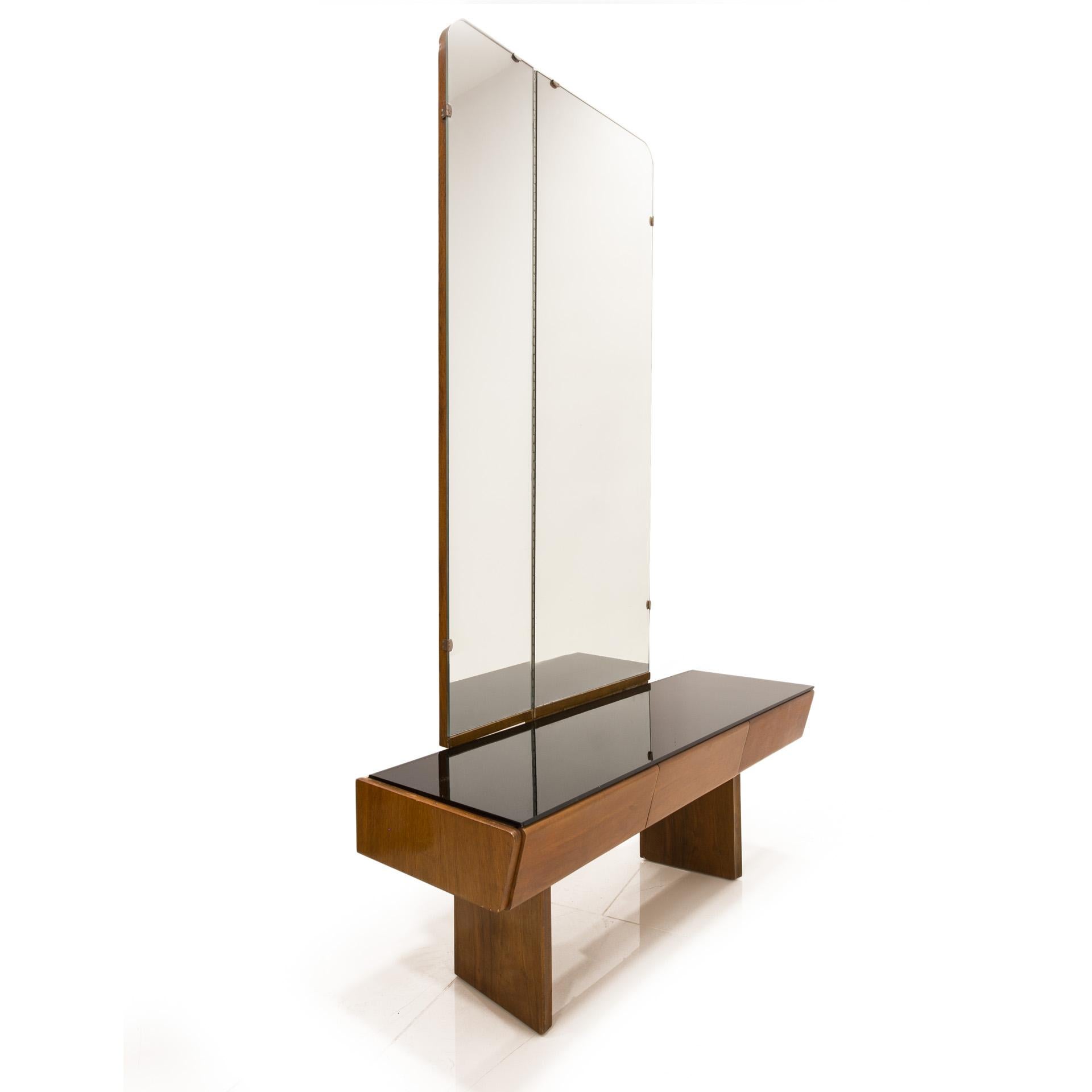 This dressing table was designed by famous Czech designer Jindrich Halabala and manufactured around 1930s. The piece is in very good original condition. It features a big vertical mirror and 3 practical drawers that provide lots of storage space.