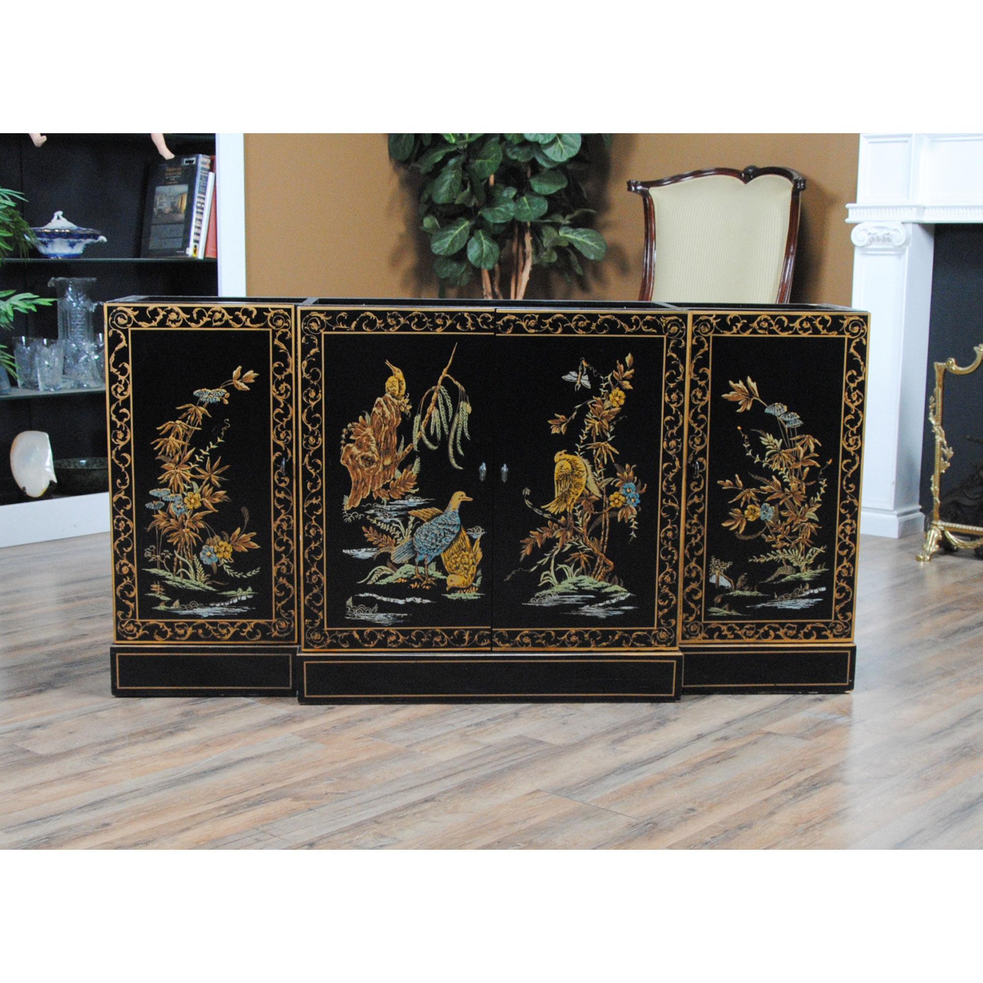 The Vintage Drexel Black Lacquered Breakfront is as elegant as China cabinets come. This breakfront accentuates and compliments any setting. Built in two parts, the Vintage Drexel Black Lacquered Breakfront top section features limited lattice work