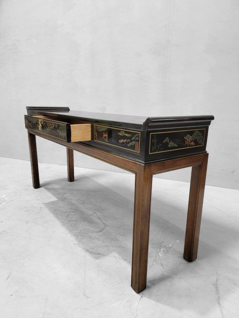 Vintage Drexel Chinoiserie Style Hand Painted Console Table 

This vintage Chinoiserie style hand painted console/sofa table is part of the Et Cetera Collection for Drexel Heritage. The table top and sides have been painted with peaceful outdoor